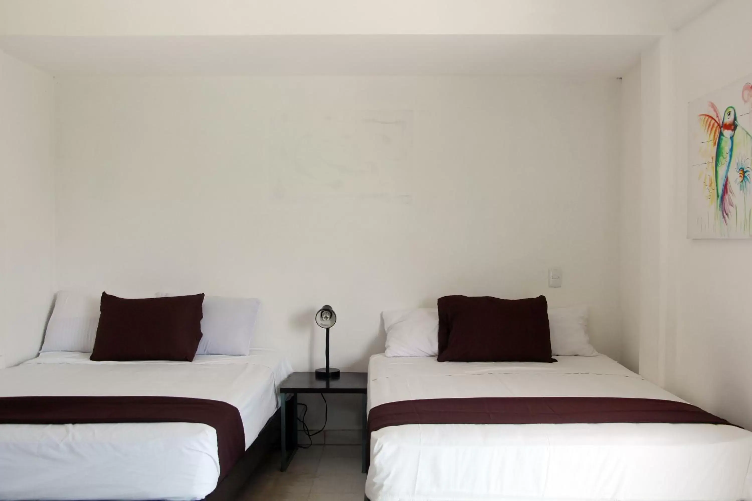 Bed in Hotel & Hostal Casa de Luz Cancun