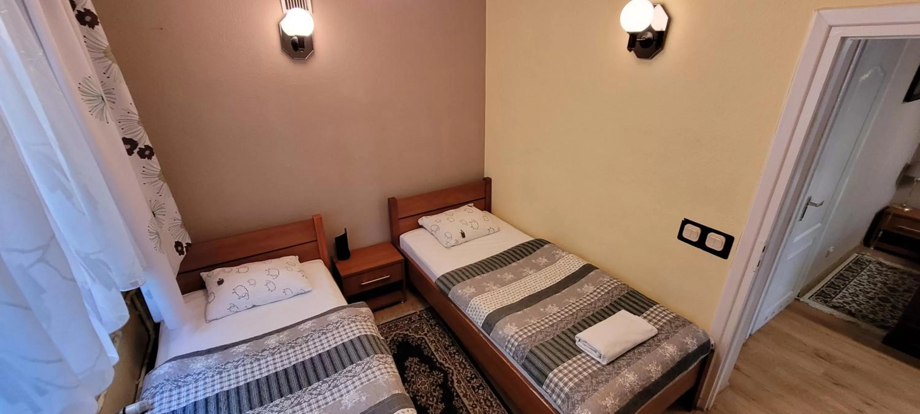 Bed in Dworek Pokoje Gościnne