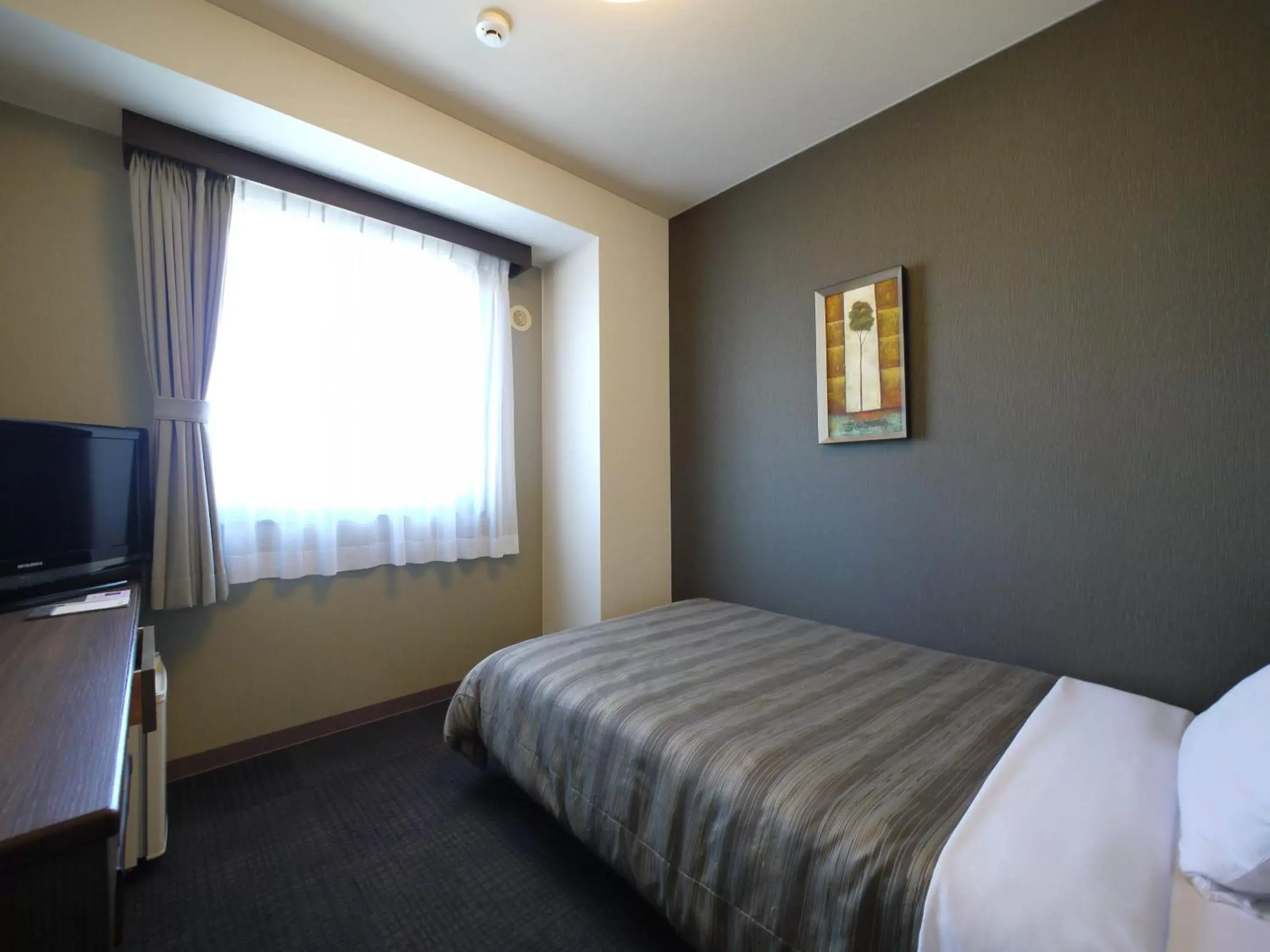 Bed in Hotel Route-Inn Kakamigahara