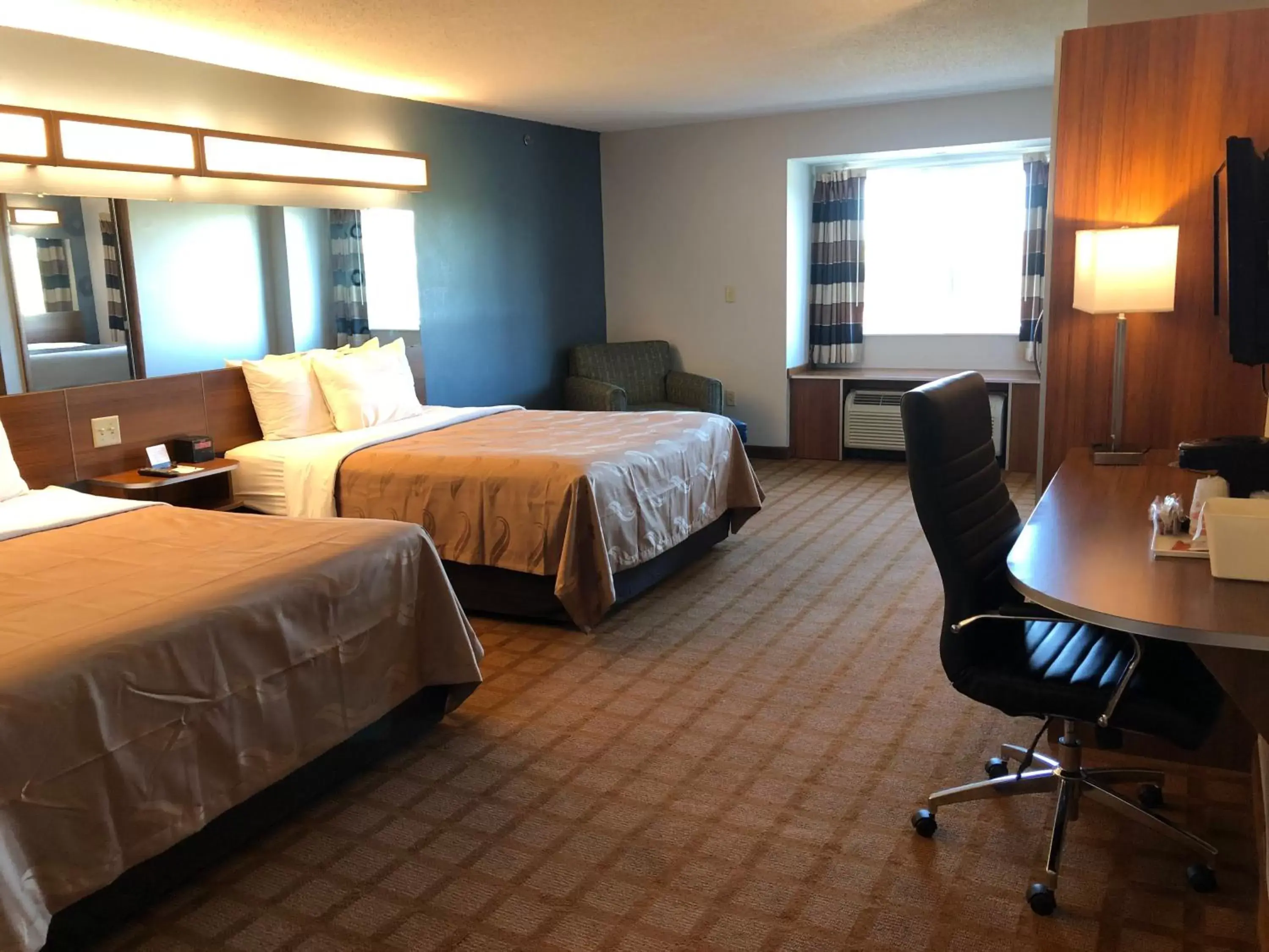 Bed in Quality Inn & Suites Watertown Fort Drum