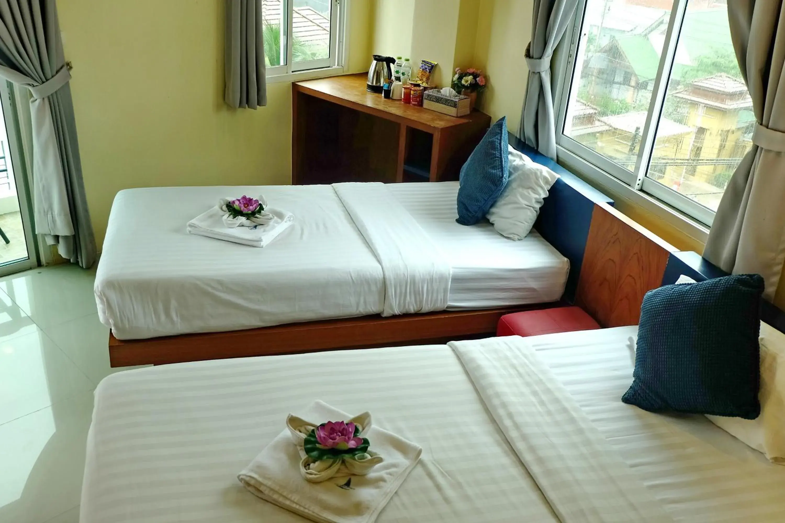 Bed in Calypso Patong Hotel
