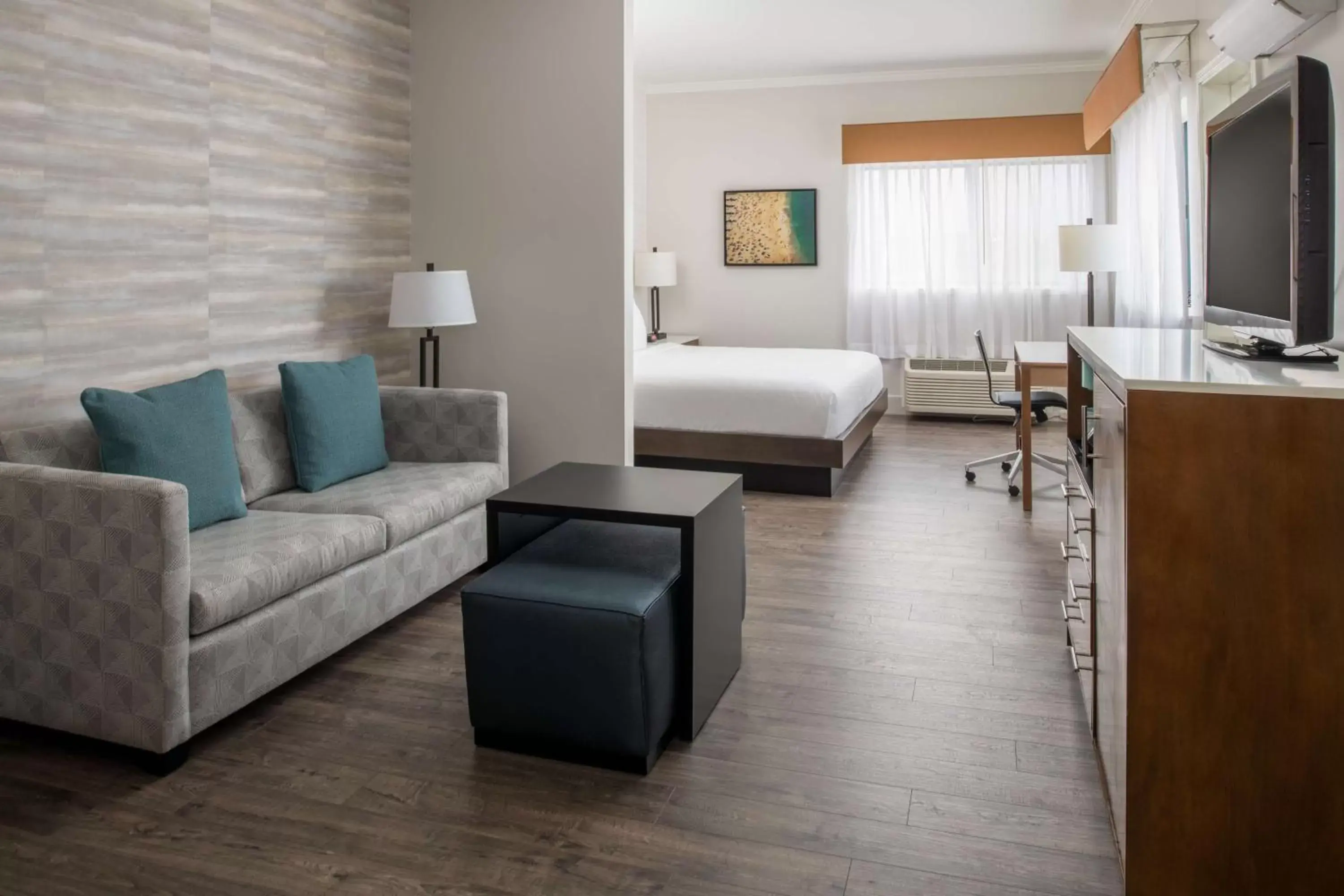 Bedroom, Seating Area in Best Western Plus All Suites Inn