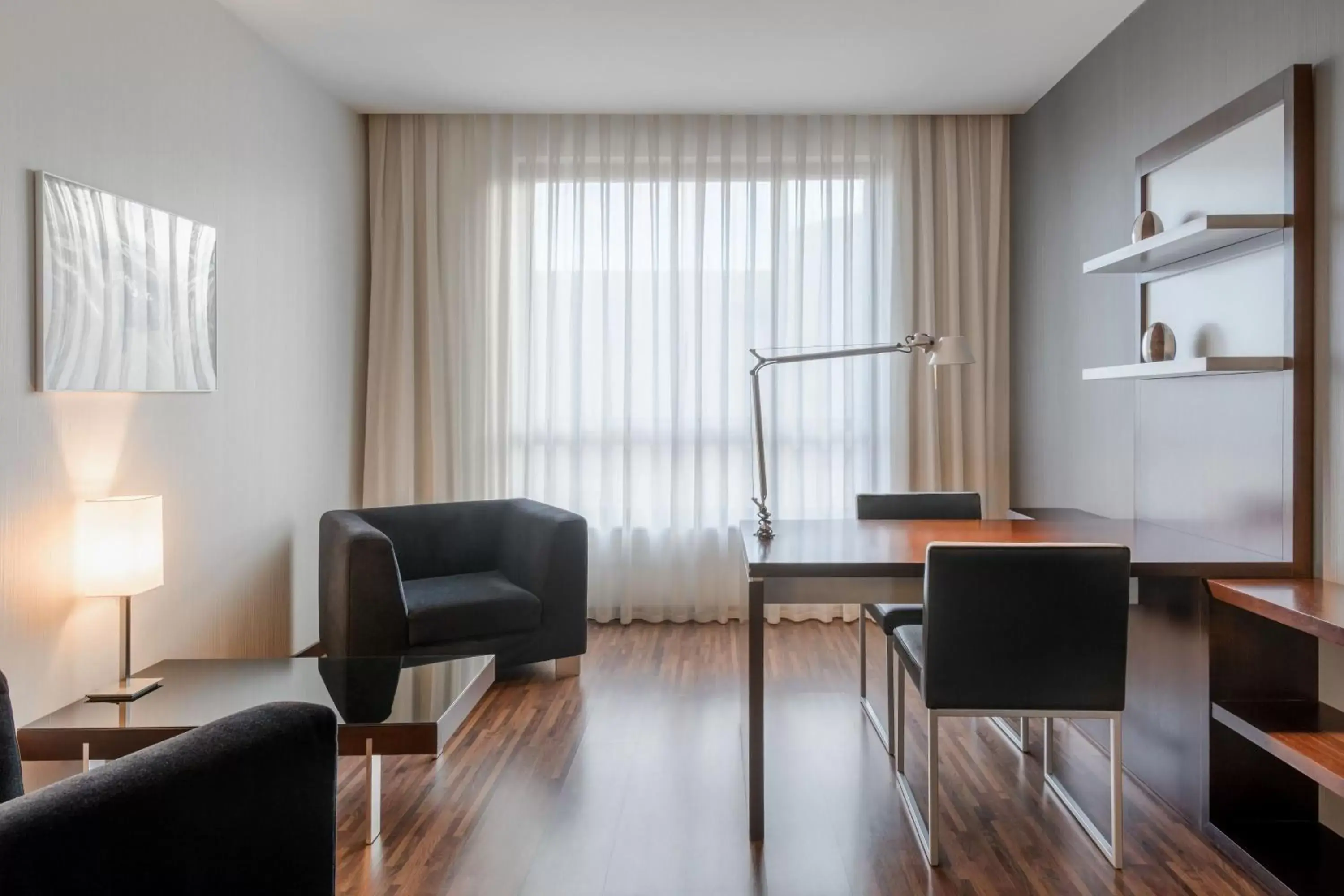 Photo of the whole room, Seating Area in AC Hotel Coslada Aeropuerto by Marriott