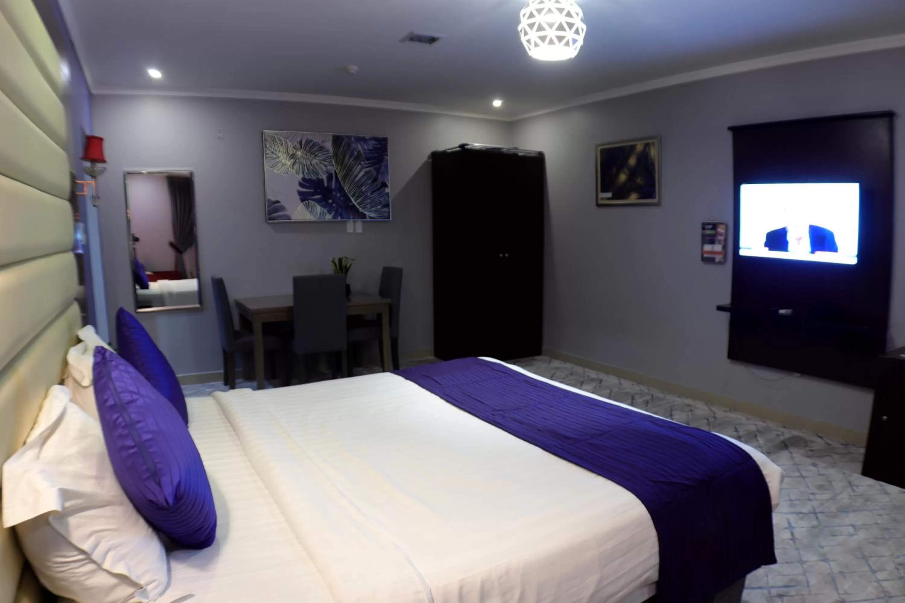 Bed in Maskan Al Dyafah Hotel Apartments