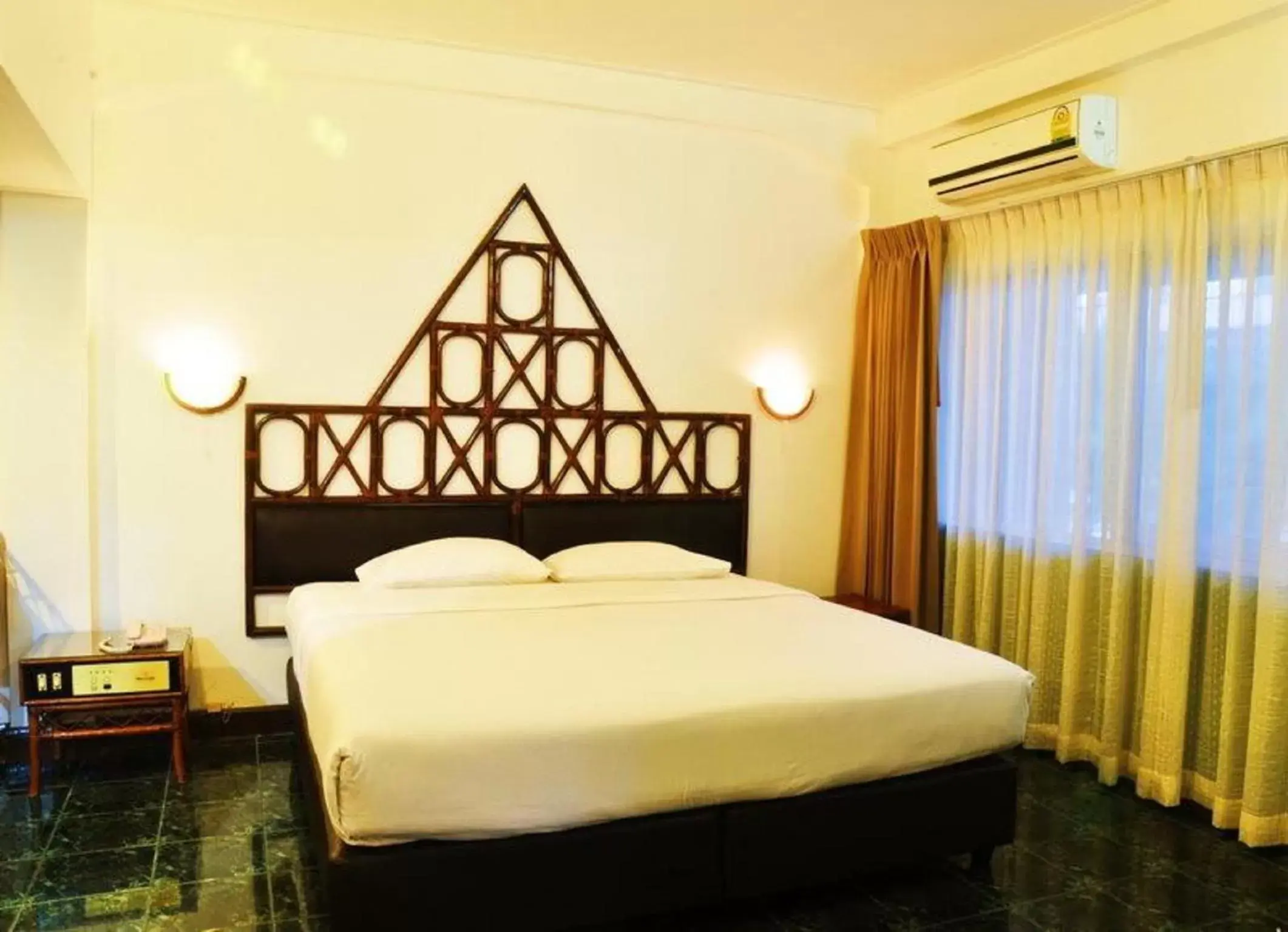 Bed in Basaya Beach Hotel & Resort