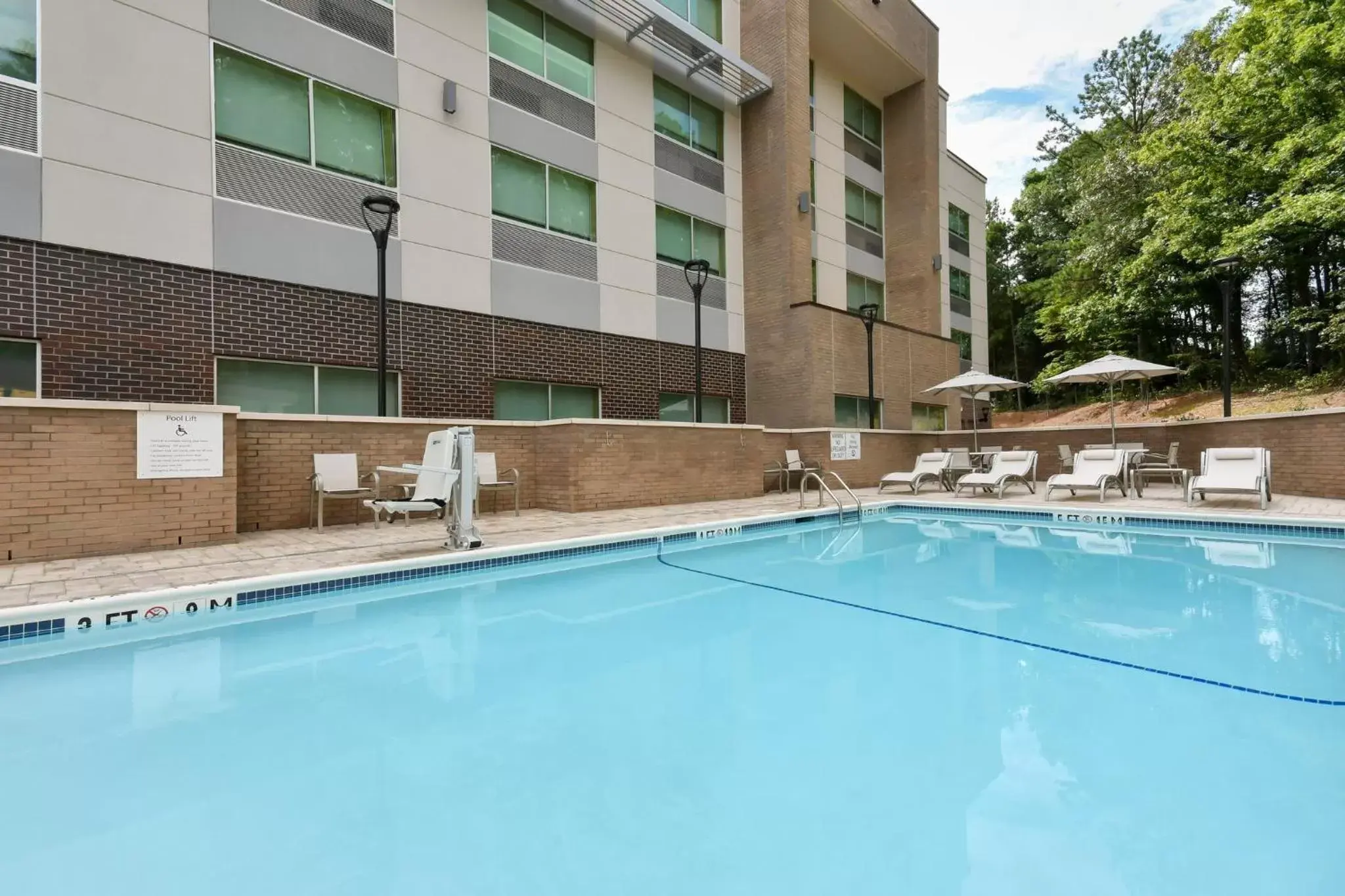 Swimming Pool in Holiday Inn Express & Suites Charlotte - Ballantyne, an IHG Hotel