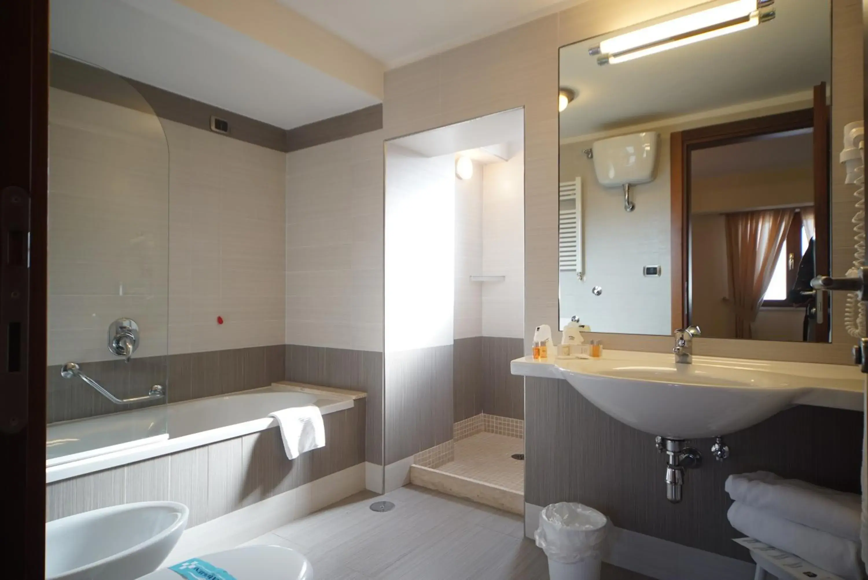 Bathroom in Suites & Residence Hotel