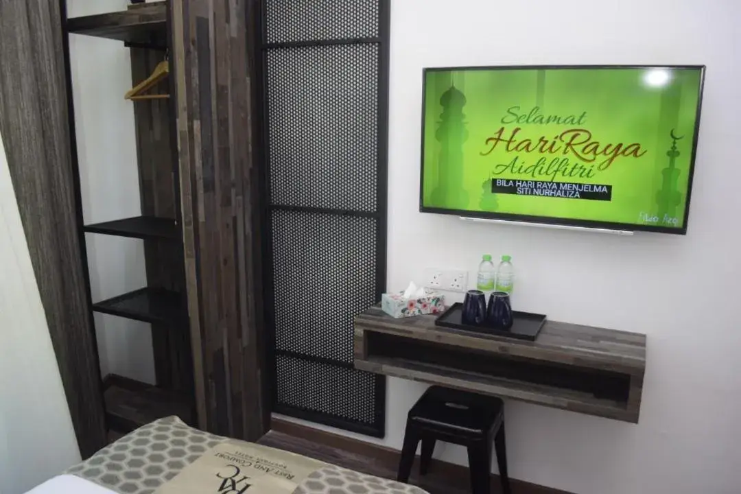 TV/Entertainment Center in Rest And Comfort Boutique Hotel