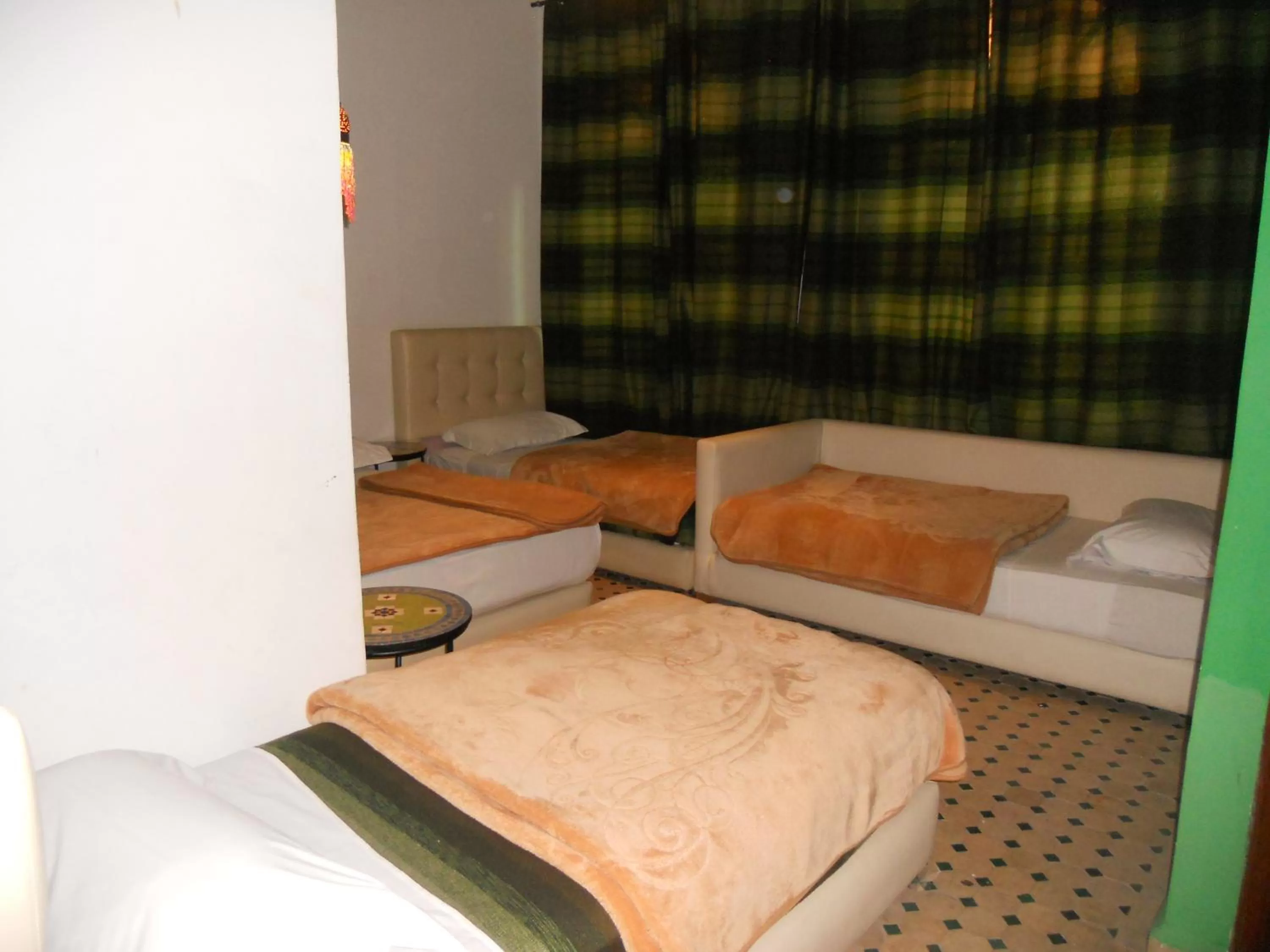 Bed in Riad Passiflora