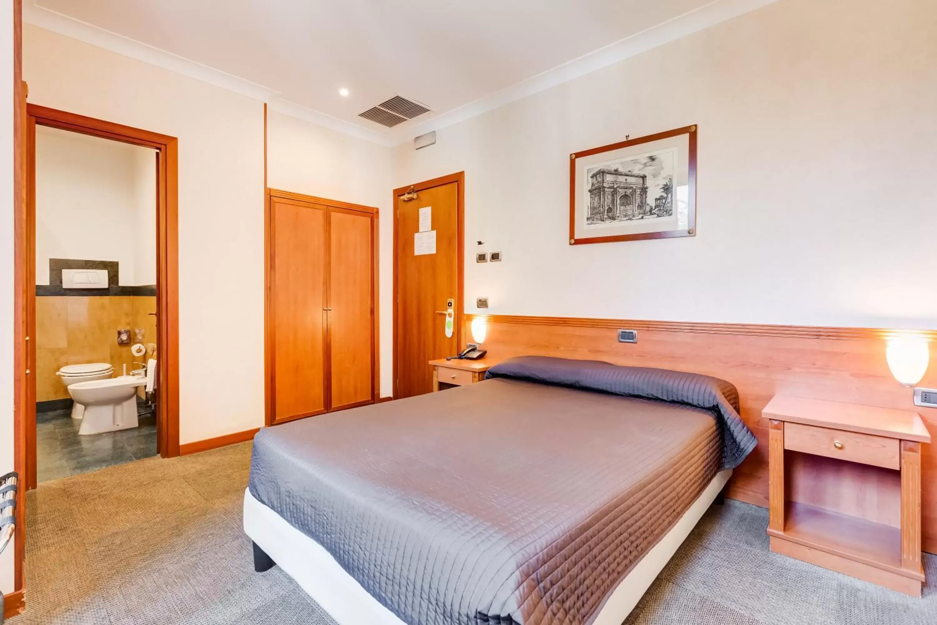 Bed in Romoli Hotel