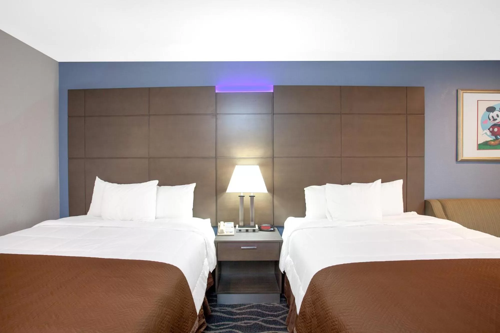 Bed in Travelodge Inn & Suites by Wyndham Anaheim on Disneyland Dr