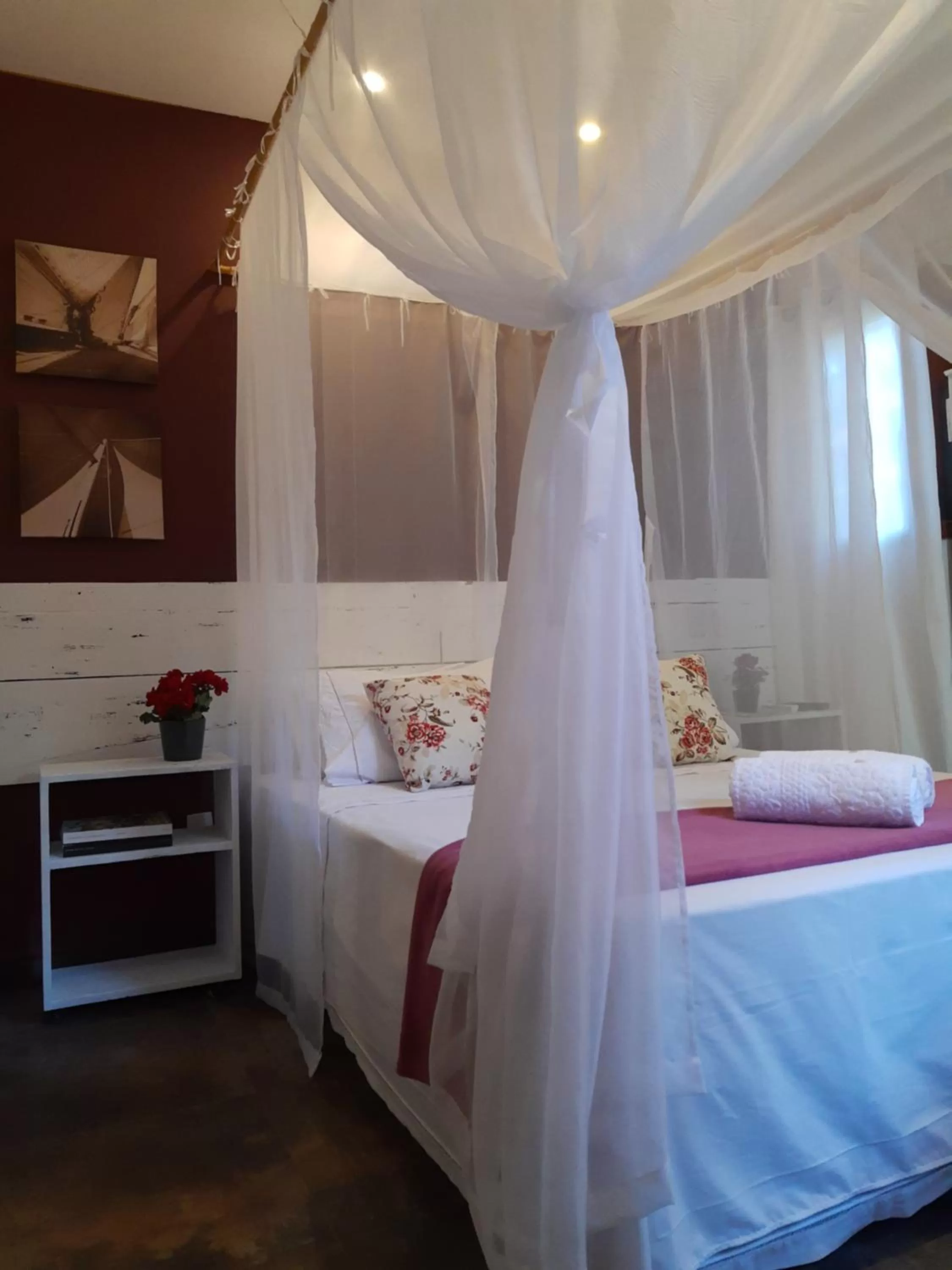 Bed in Magias de Paraty Ecopousada