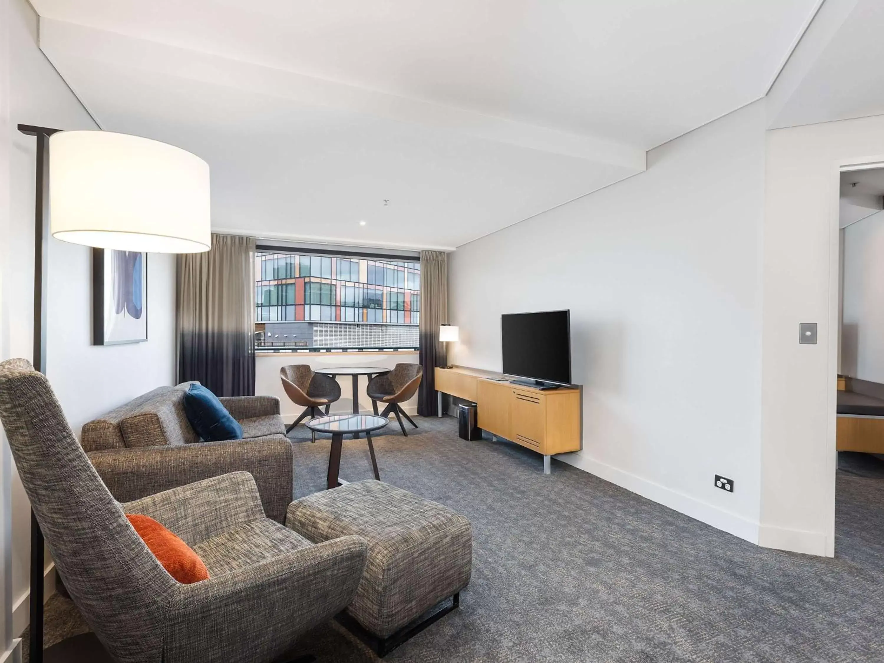 Bedroom, Seating Area in Novotel Sydney Darling Harbour