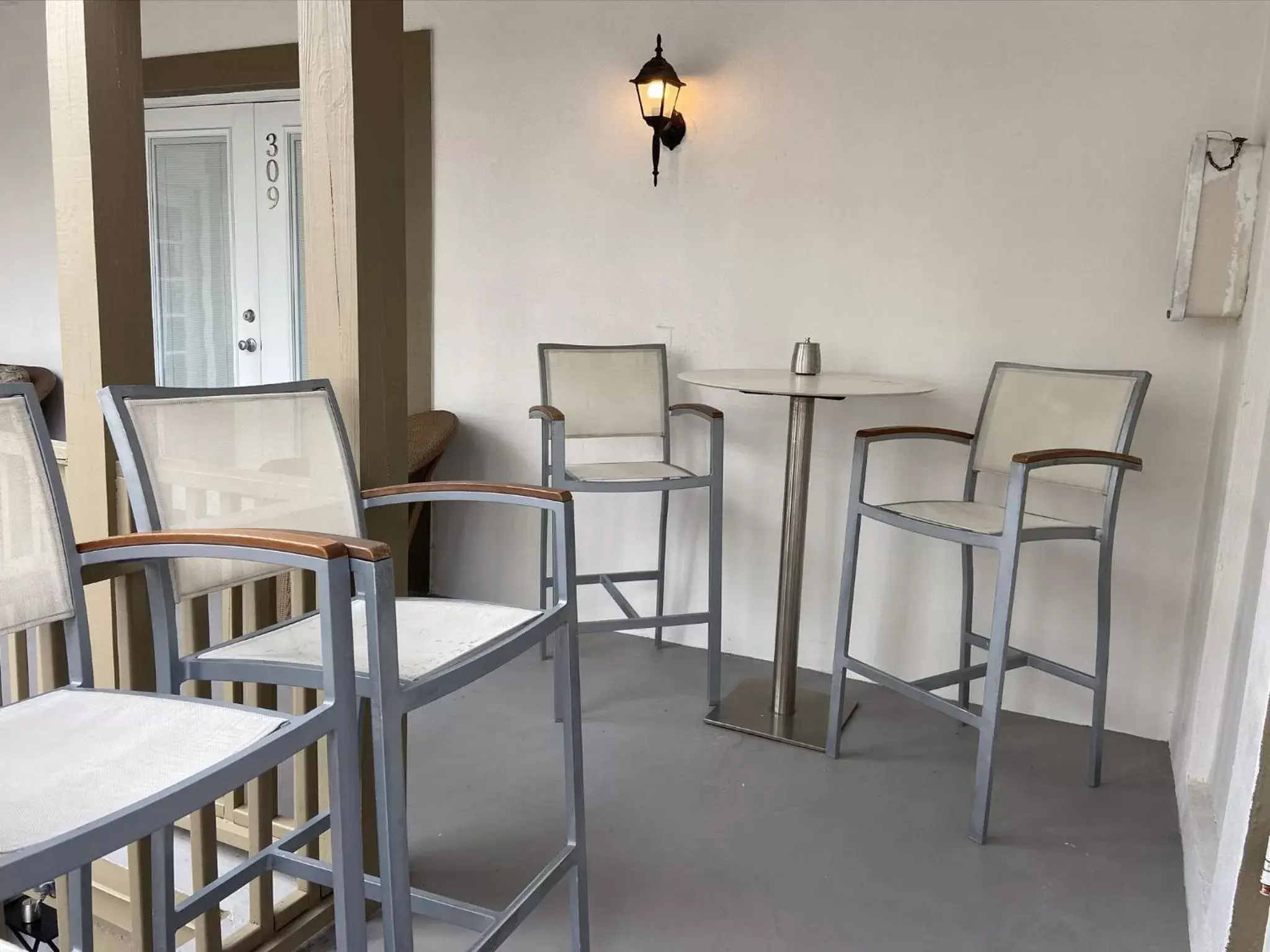 Seating area in Little Paris by the ocean self check in