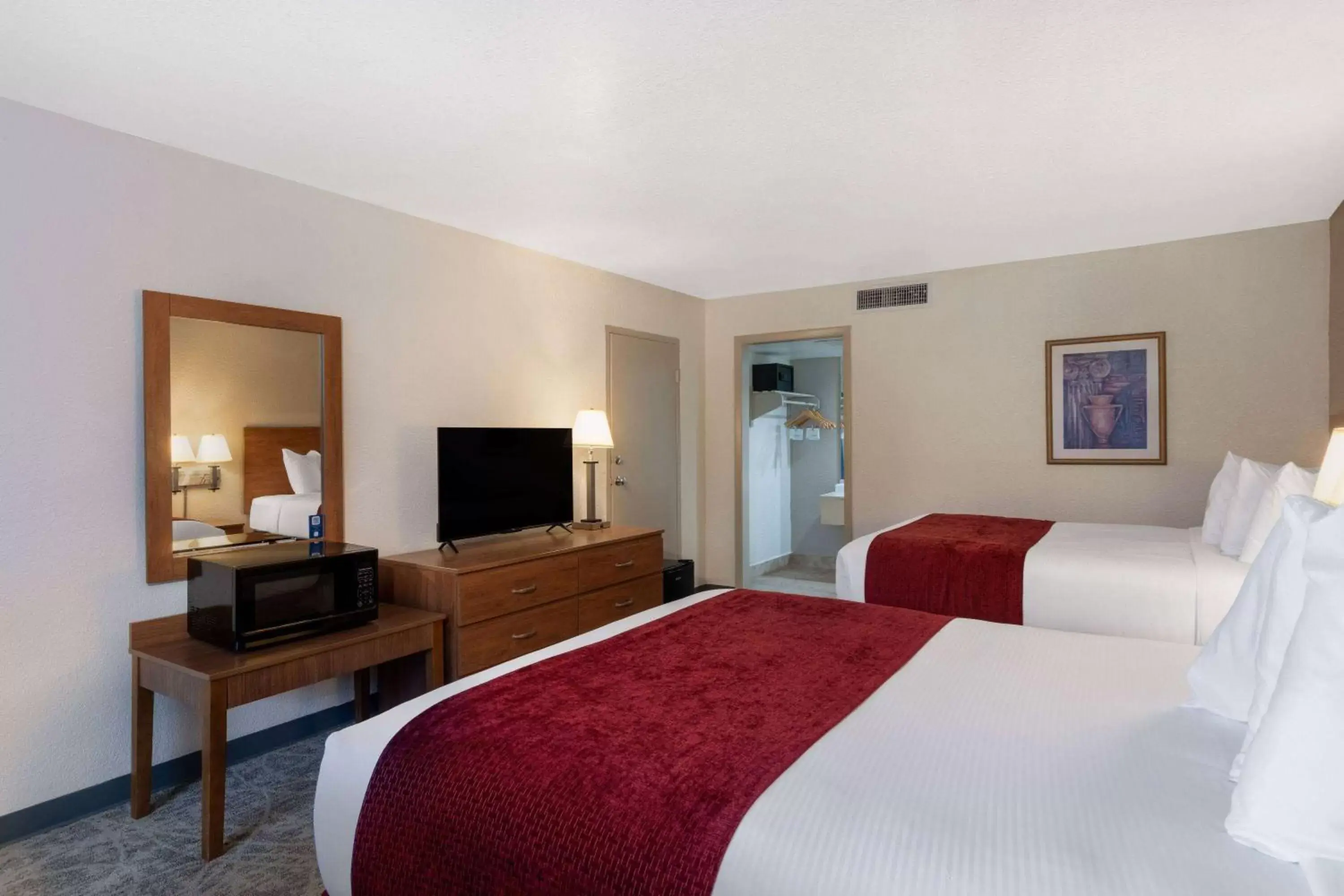 Standard 2 Queen Beds Poolview Inn Room in Ramada by Wyndham Kissimmee Gateway