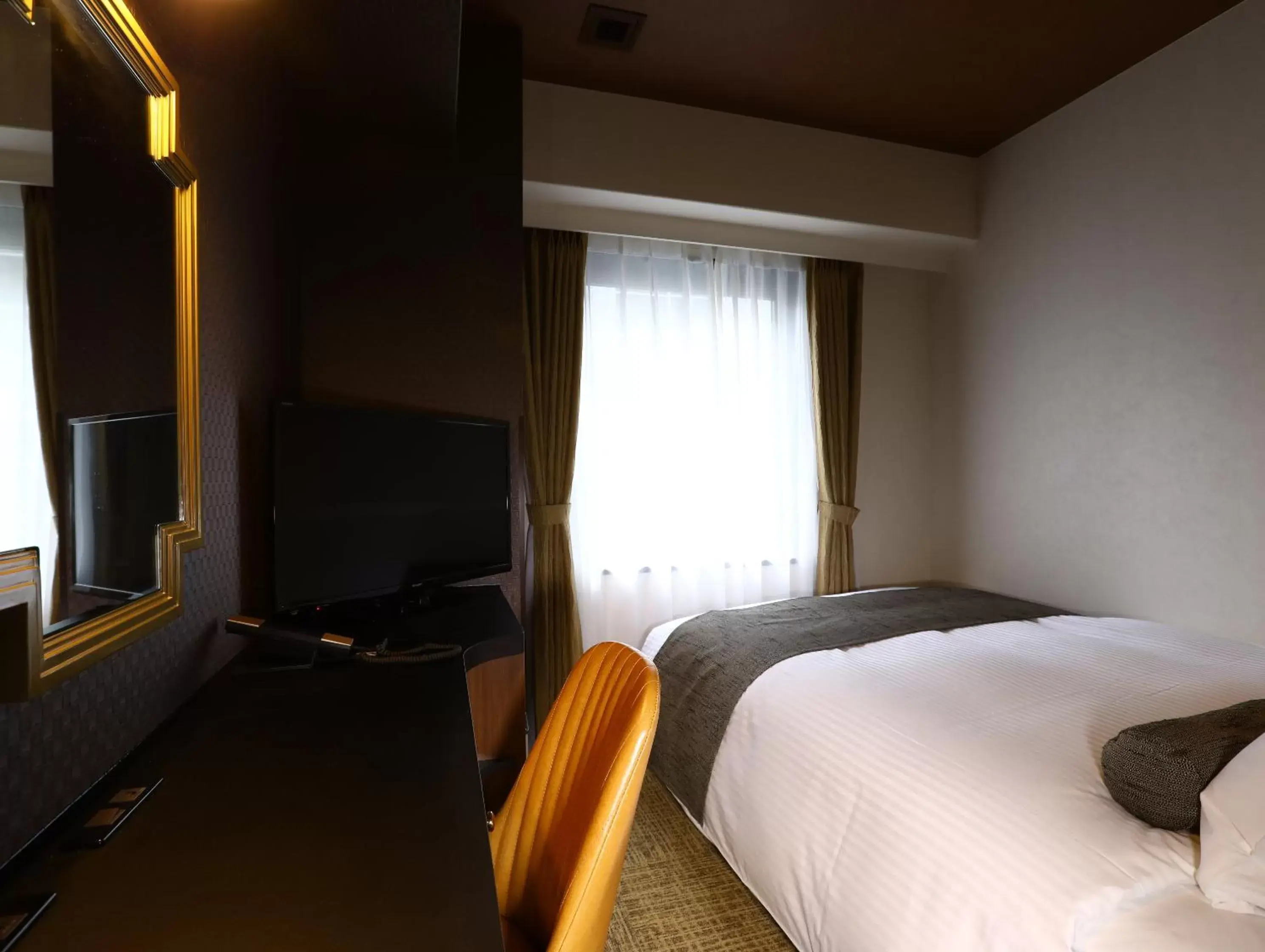 Bed in Hotel Wing International Select Osaka Umeda