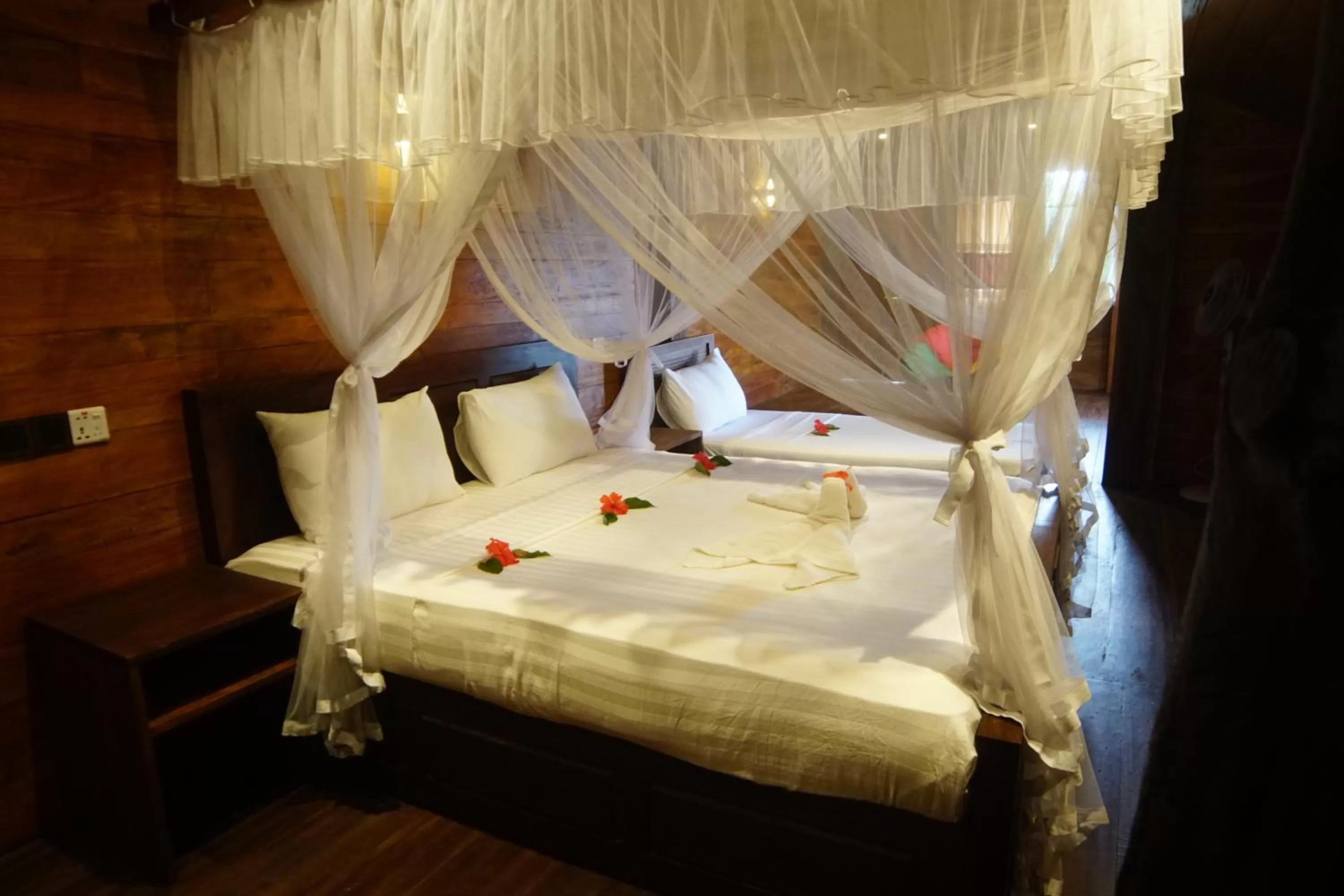 Bed in Turtle Bay Beach Resort
