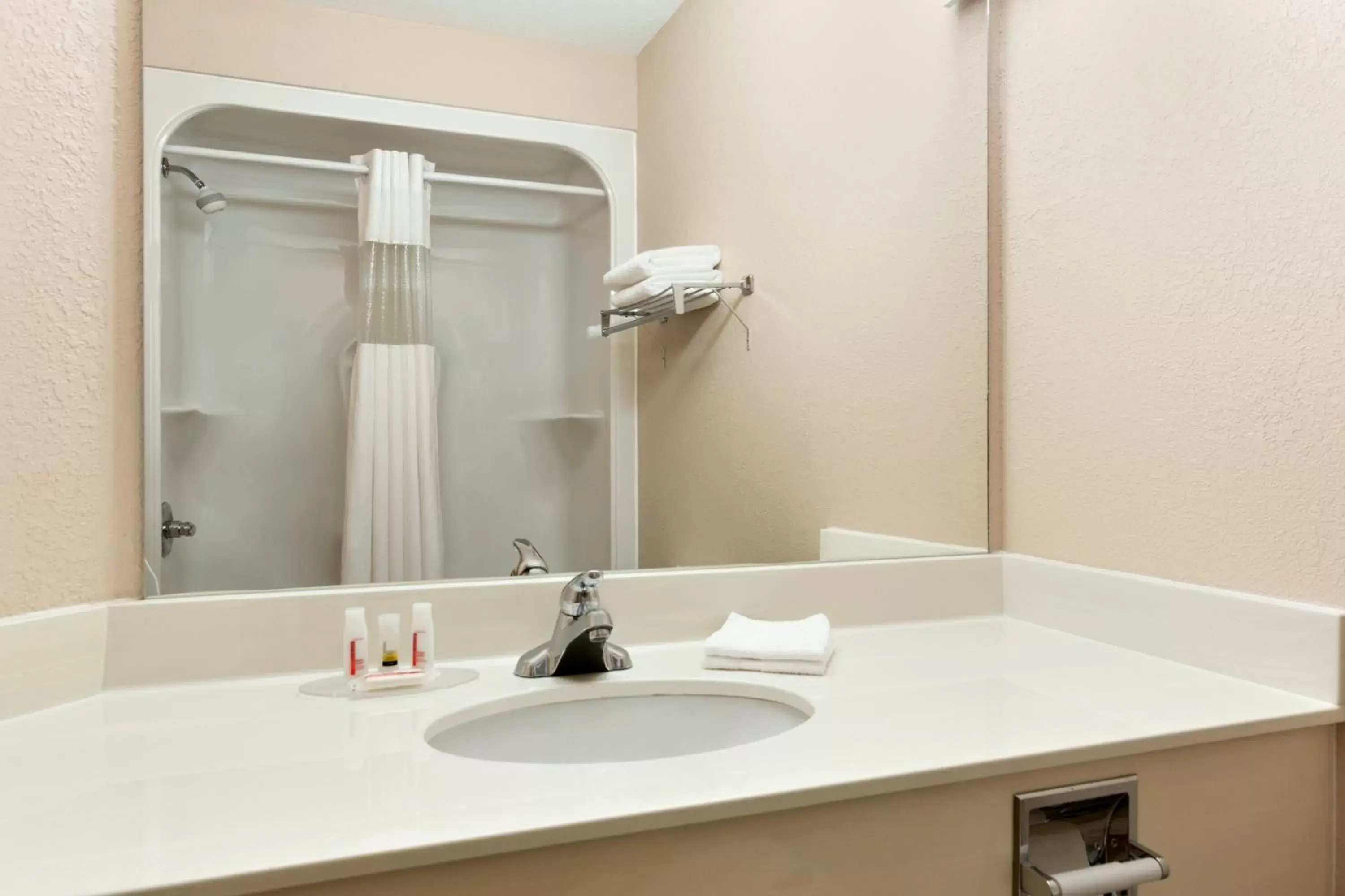Shower, Bathroom in Days Inn & Suites by Wyndham Winkler
