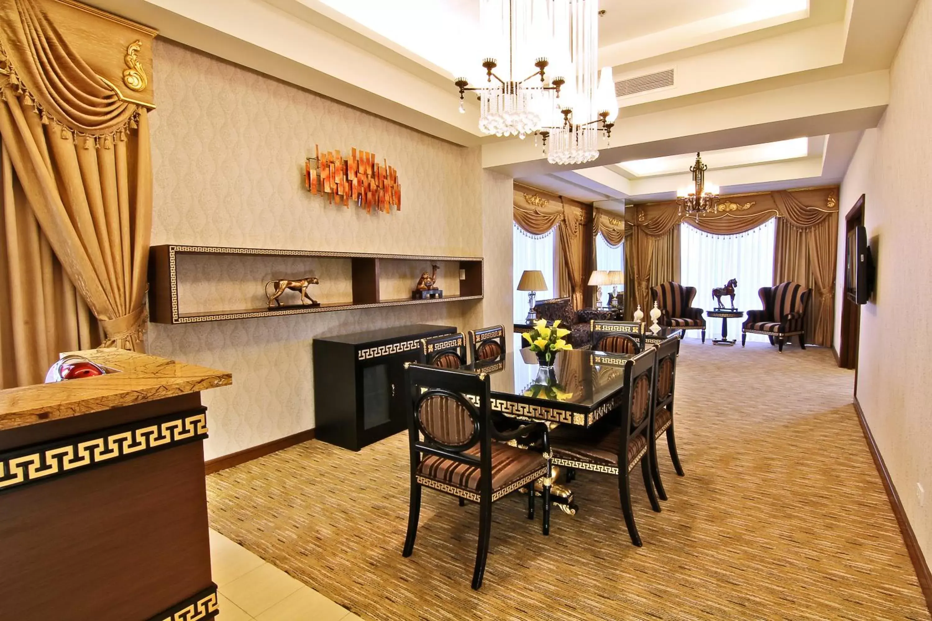 Photo of the whole room, Dining Area in Luxent Hotel