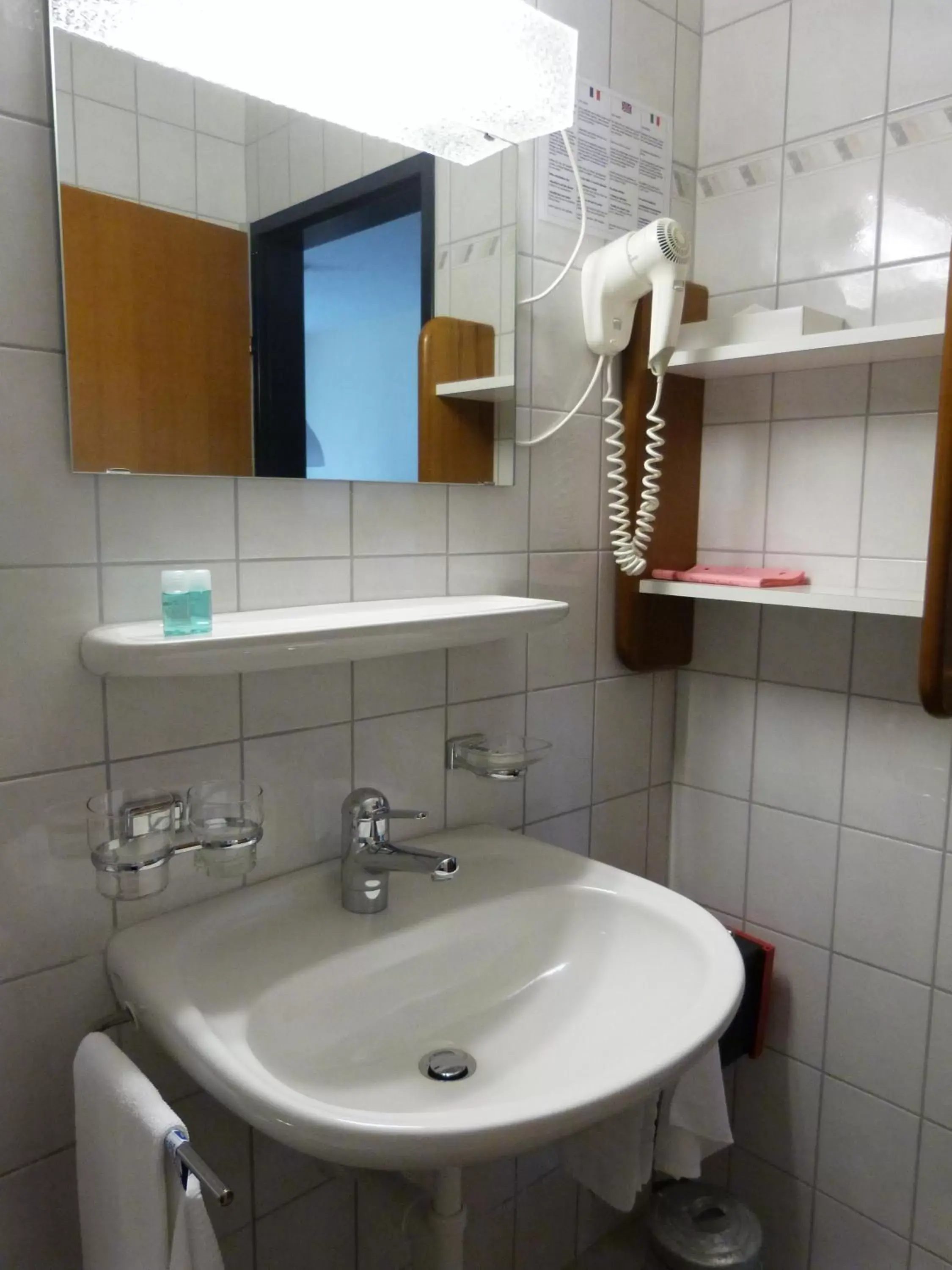 Bathroom in Hotel Sportcenter Fünf Dörfer AG