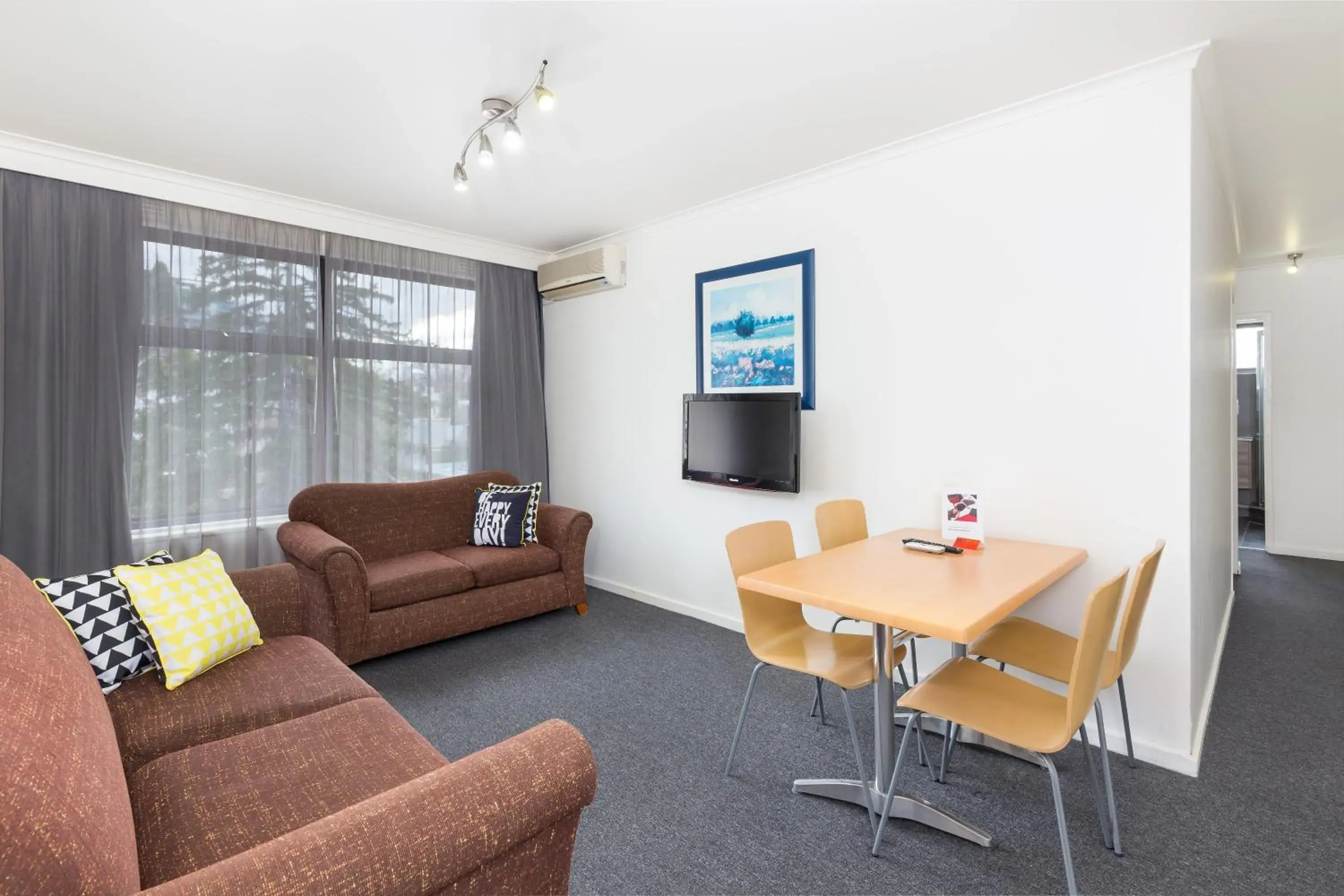 Living room, Seating Area in City Edge East Melbourne Apartment Hotel