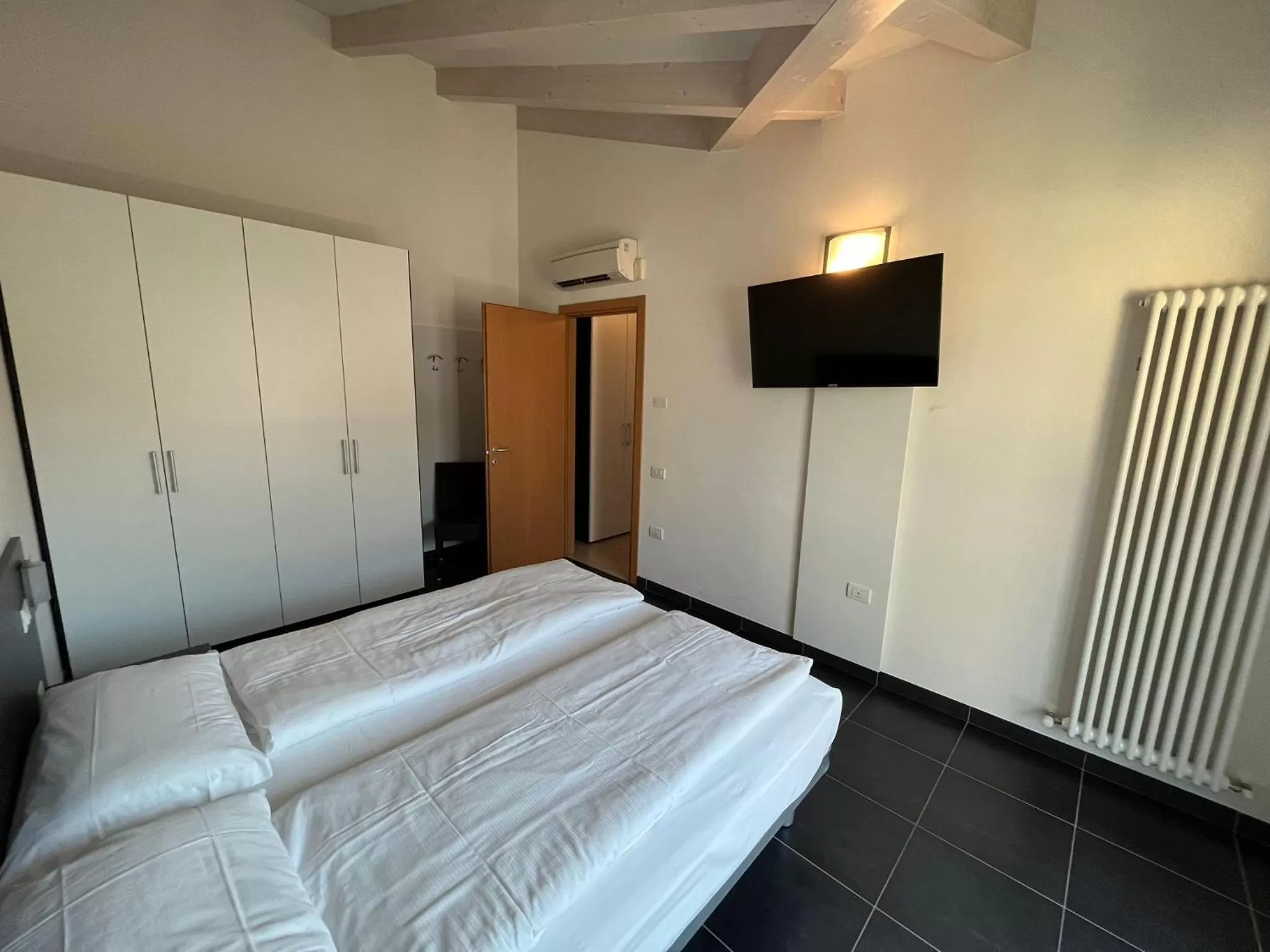 Bed in 4 Limoni Apartment Resort