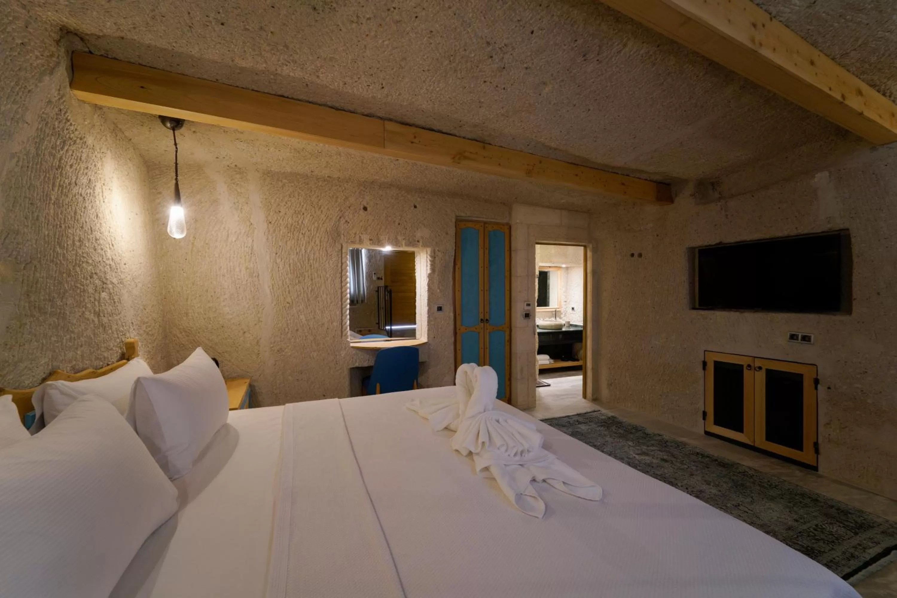 Bed in The Niche Cave Hotel