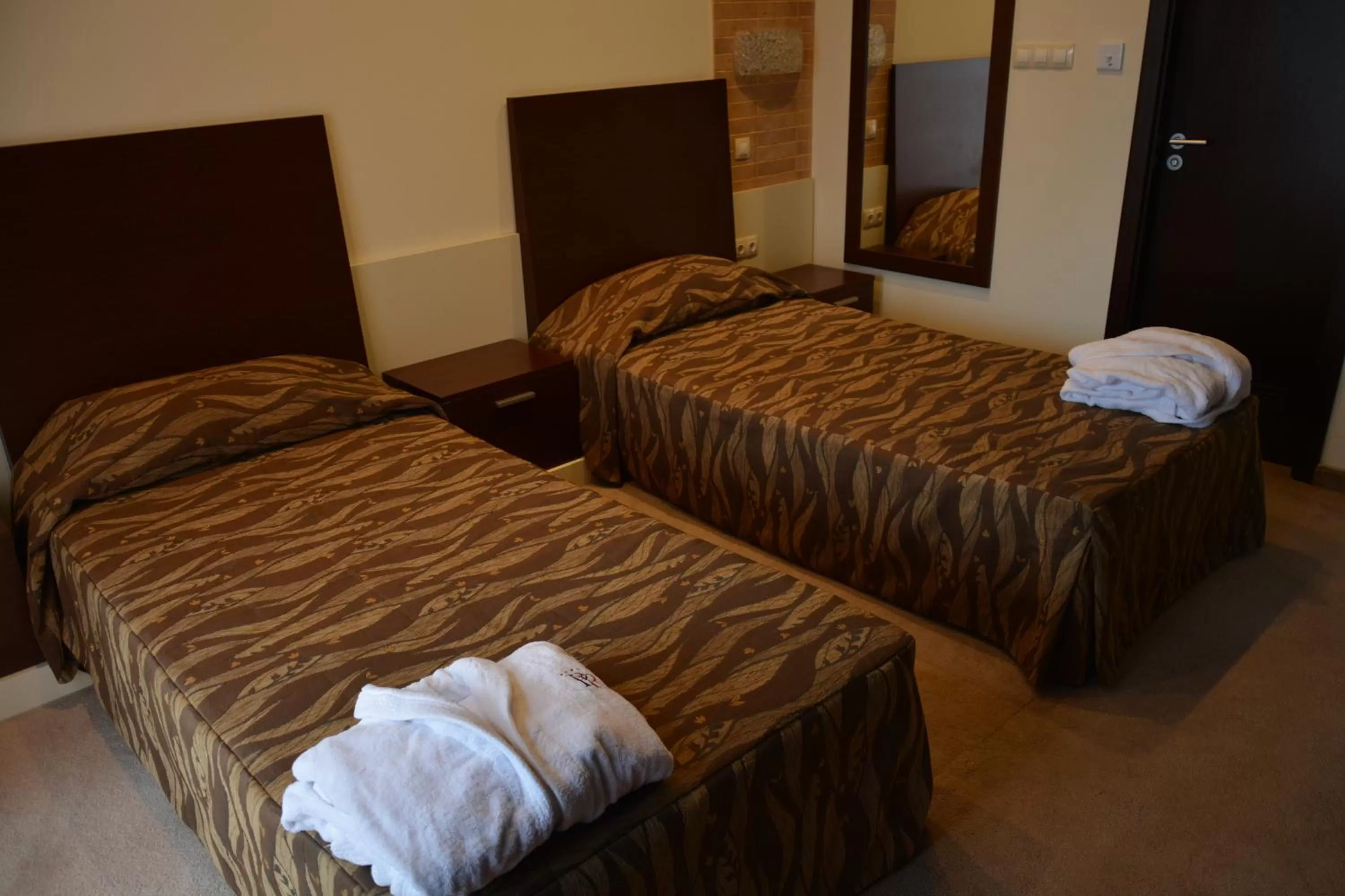 Bed in Hotel Presidivm Palace