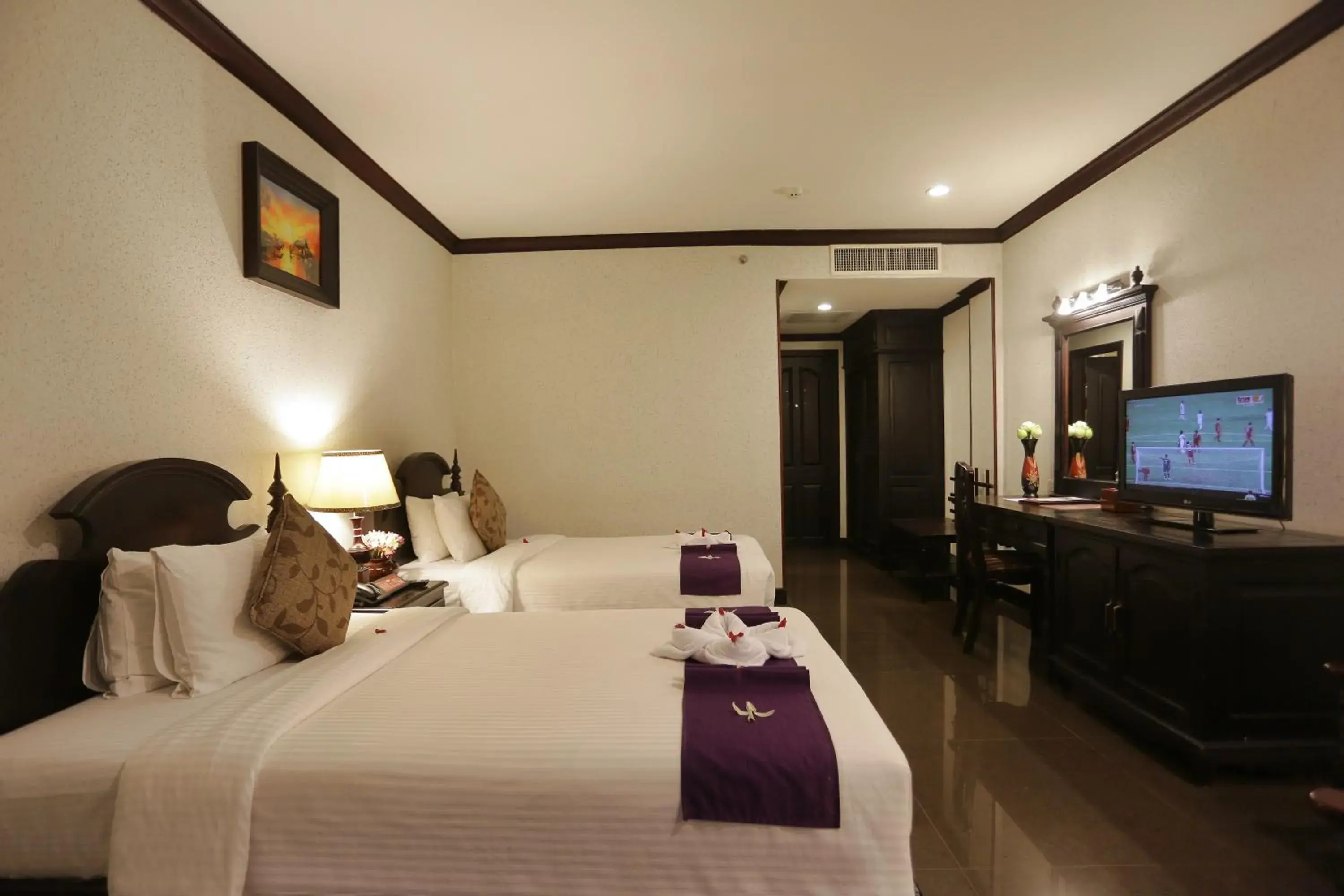 Bed in Lucky Angkor Hotel & Spa