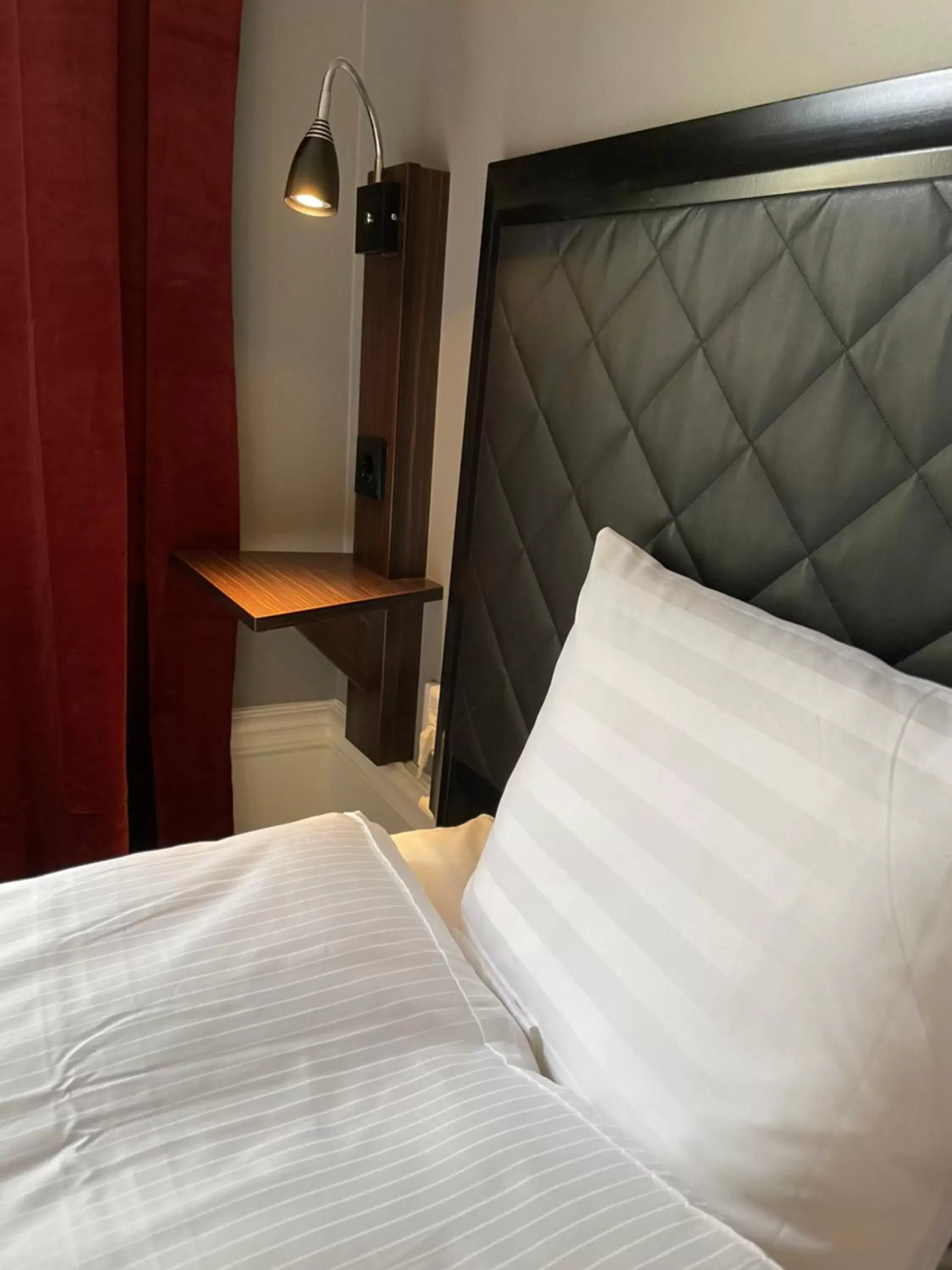 Bed in Unique Hotel Jungfrugatan