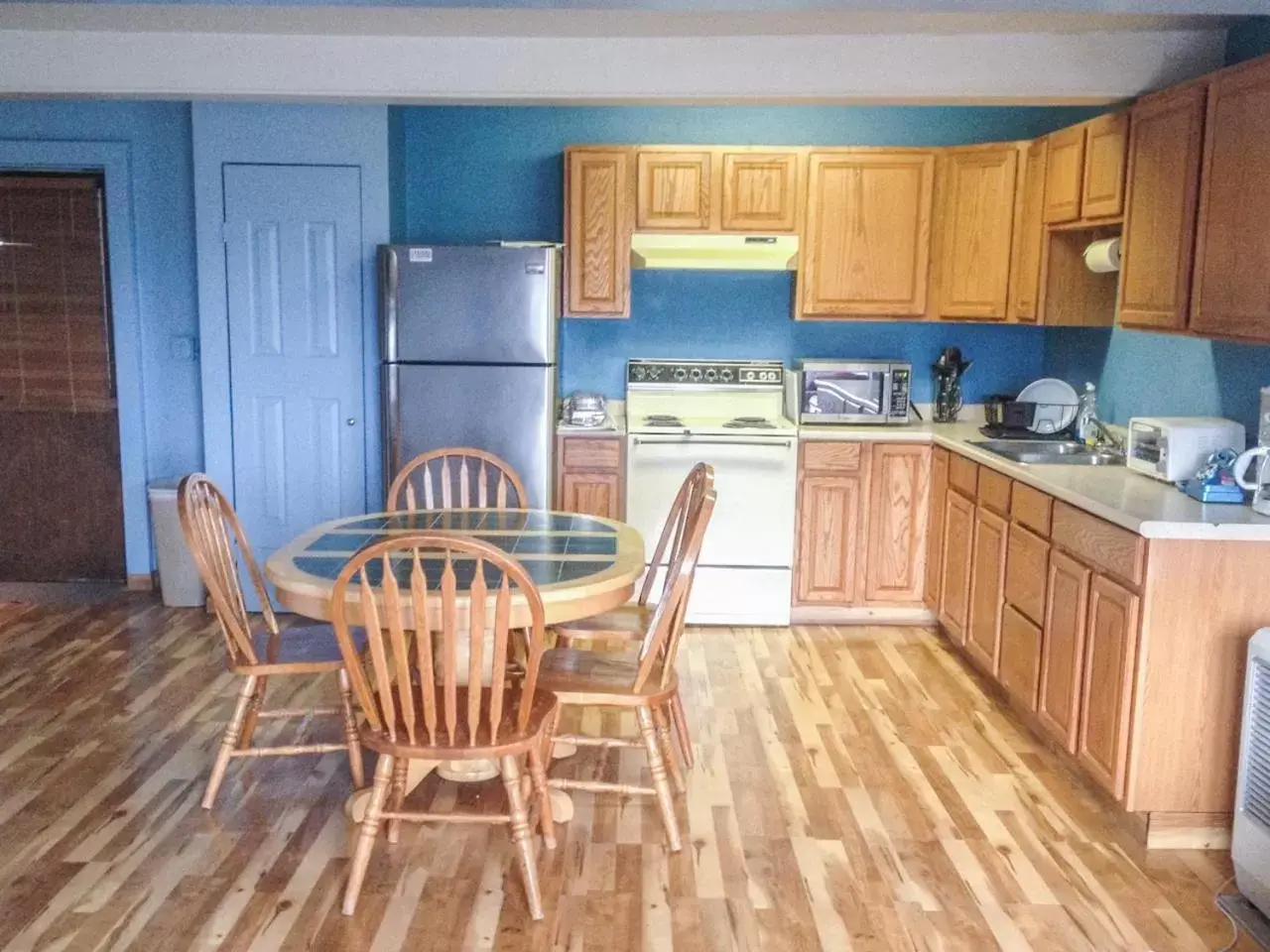 Kitchen/Kitchenette in Brown & Hawkins Historical Apartments