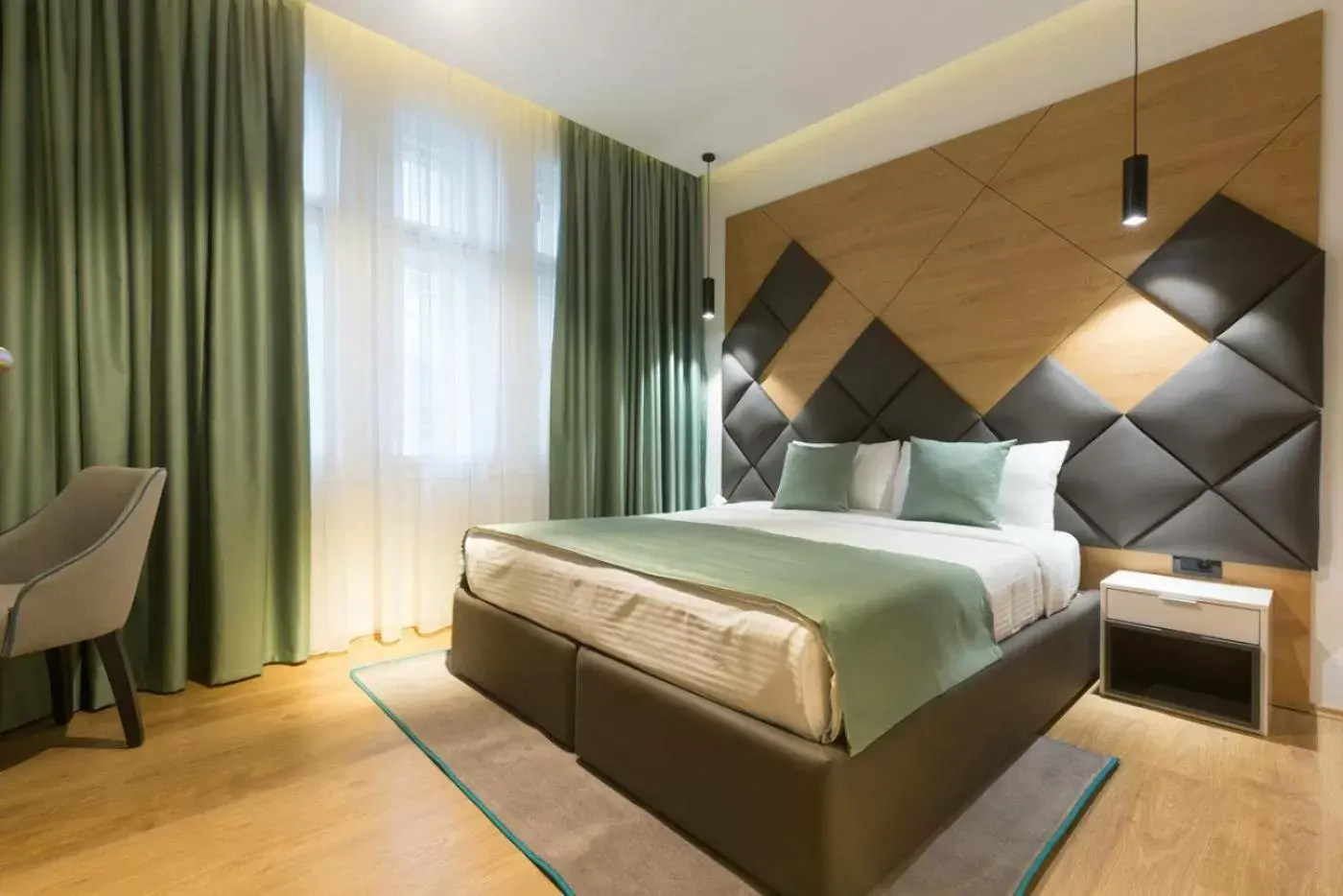 Bed in Capital Hotel Garni