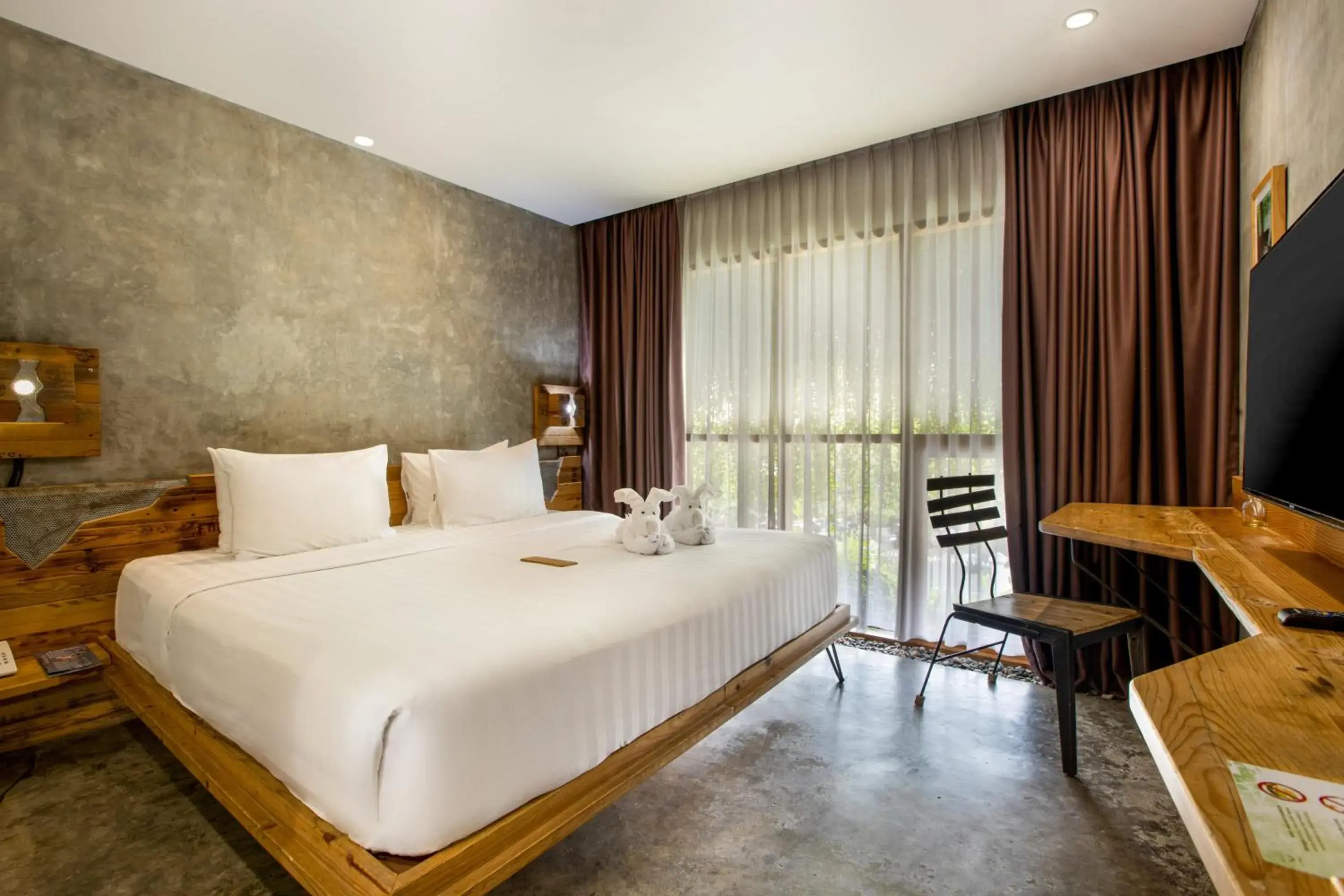 Bed in Greenhost Boutique Hotel Prawirotaman