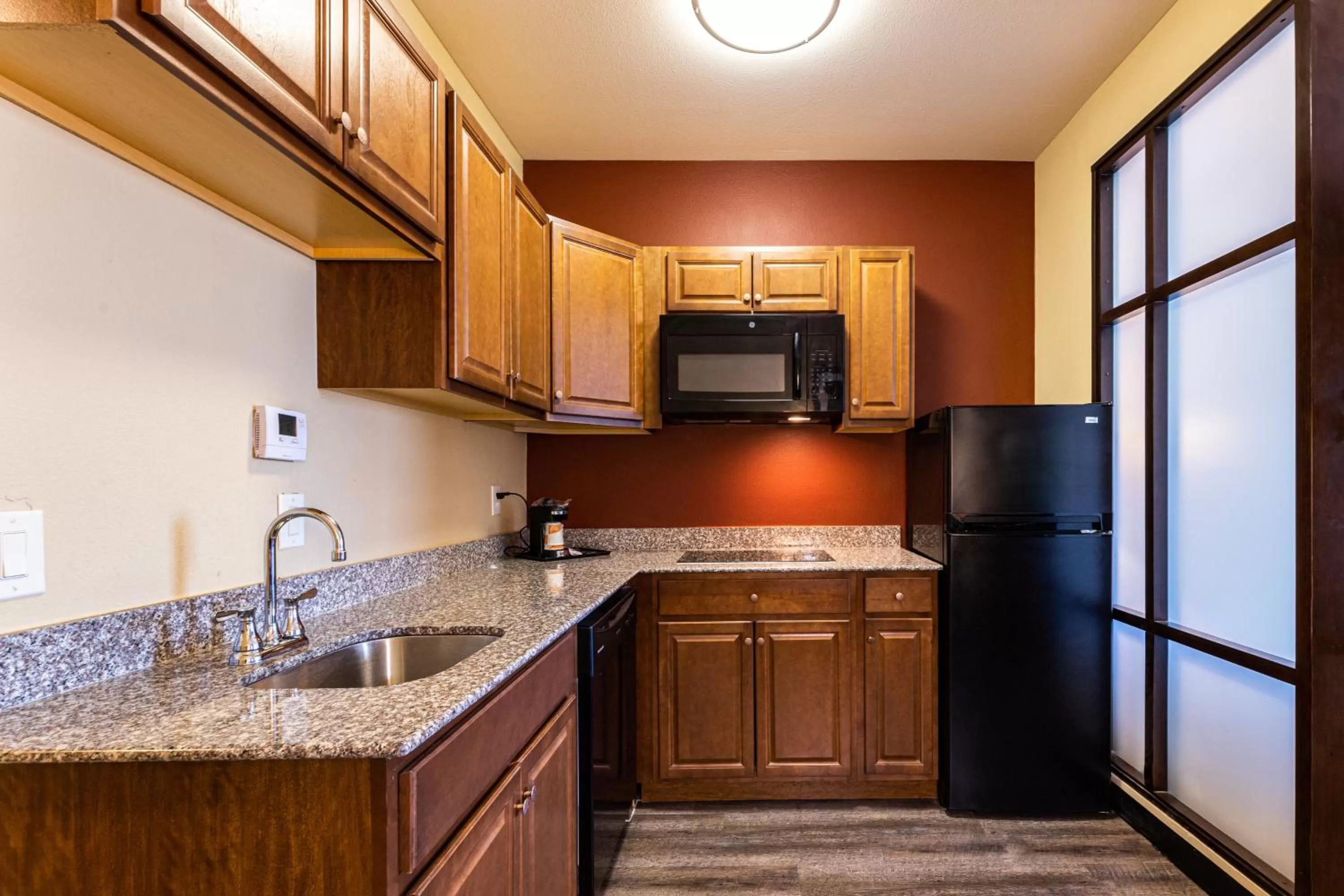 Efficiency King Suite with Kitchenette  in Comfort Suites Lake Worth