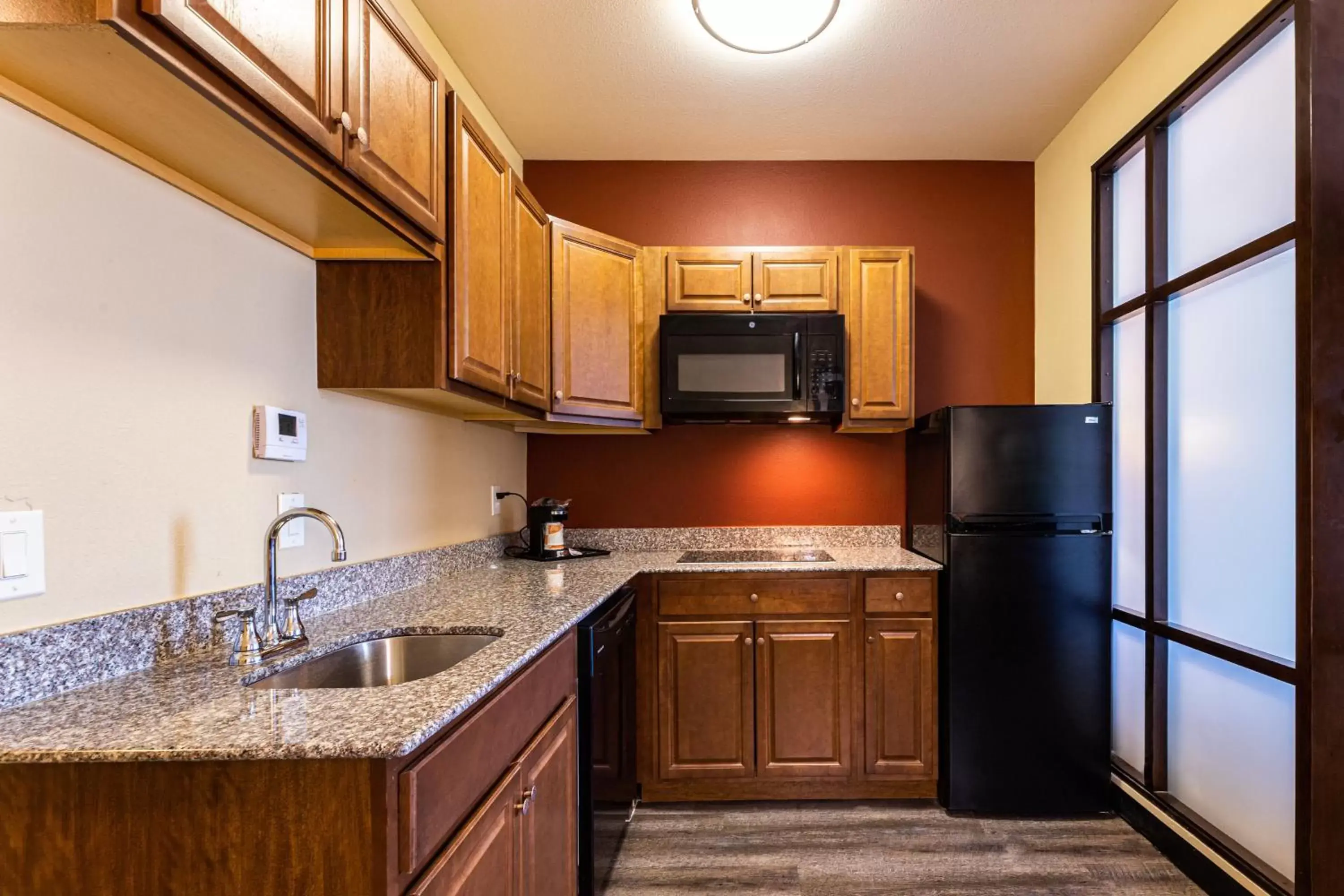 Efficiency King Suite with Kitchenette  in Comfort Suites - Lake Worth