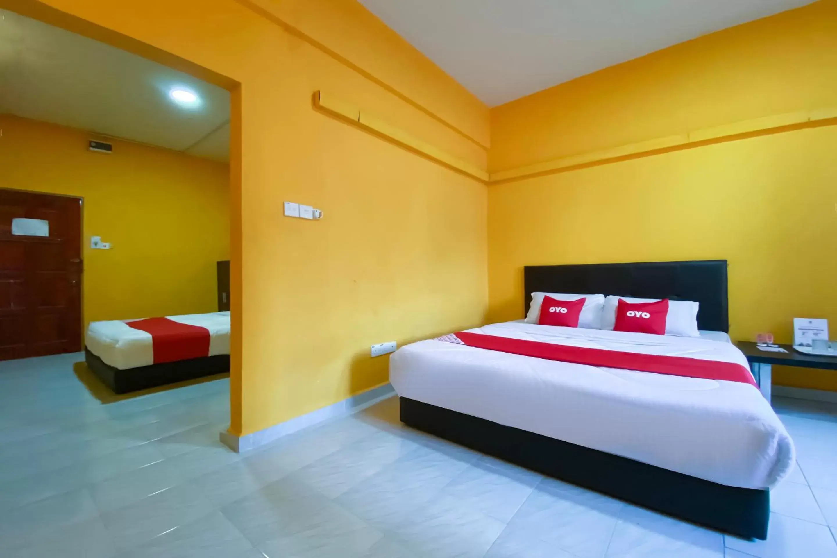 Bedroom in Super OYO 90039 Coop Hotel Kangar