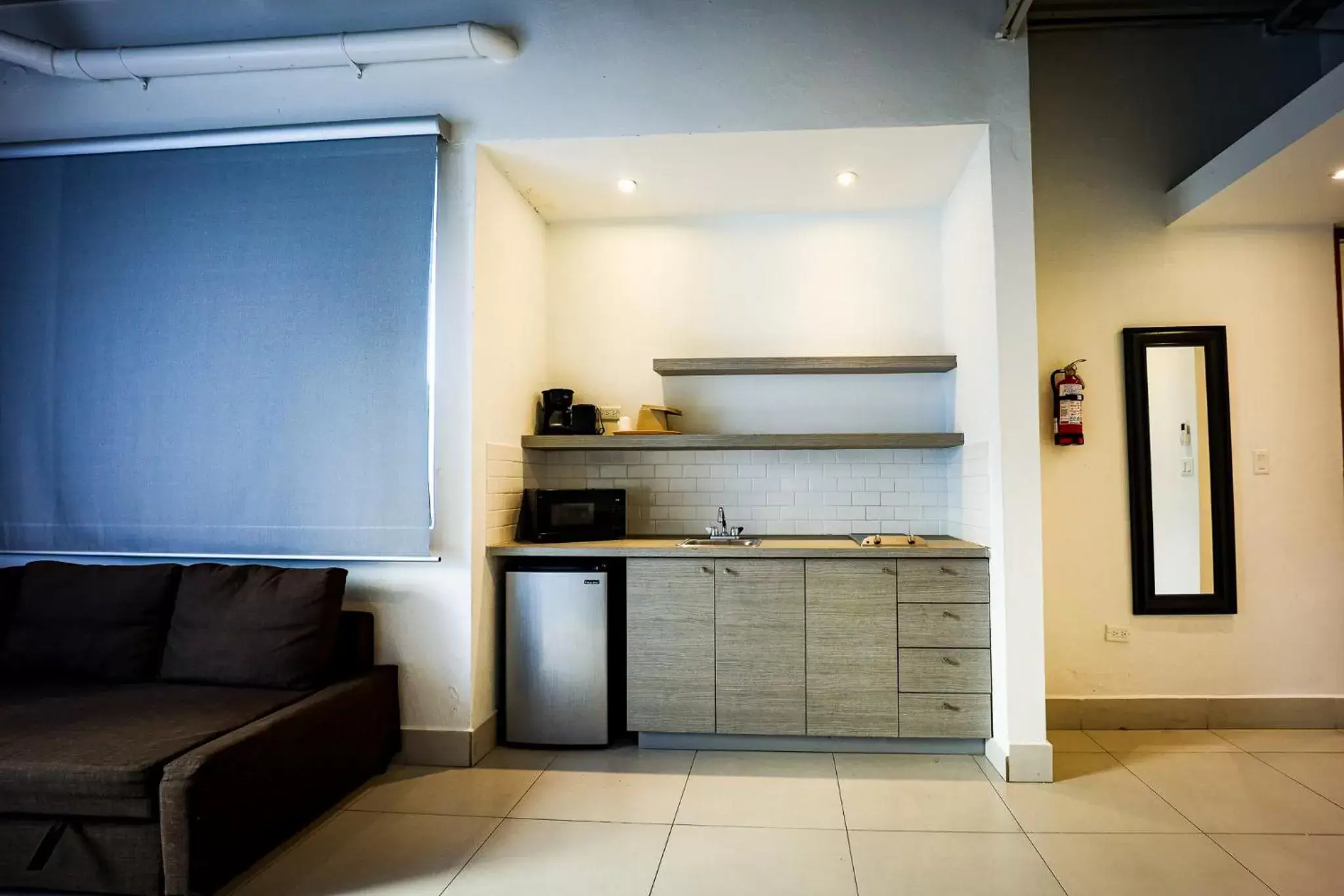 Kitchen/Kitchenette in Coral Suites