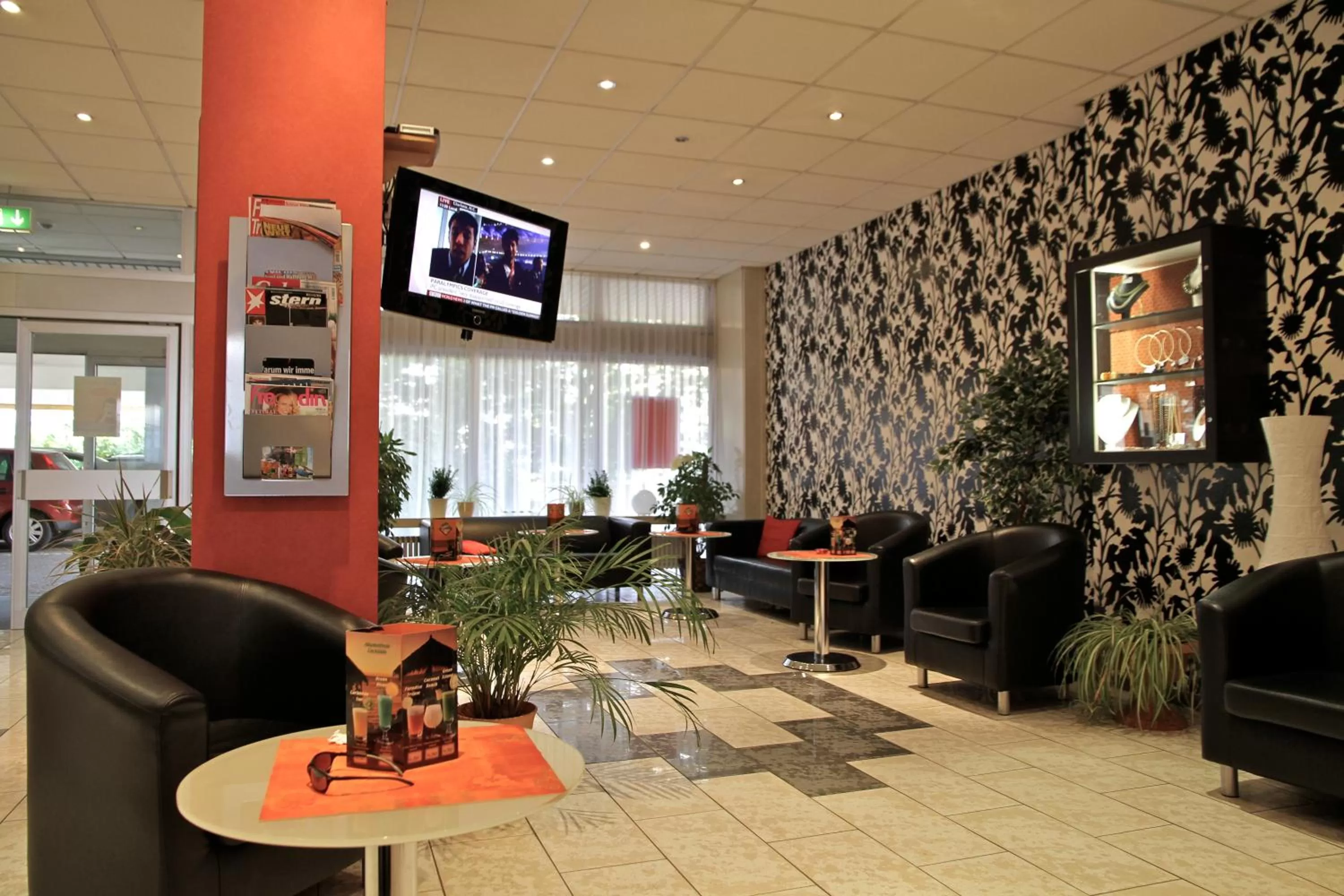 Lobby or reception in Opal Hotel