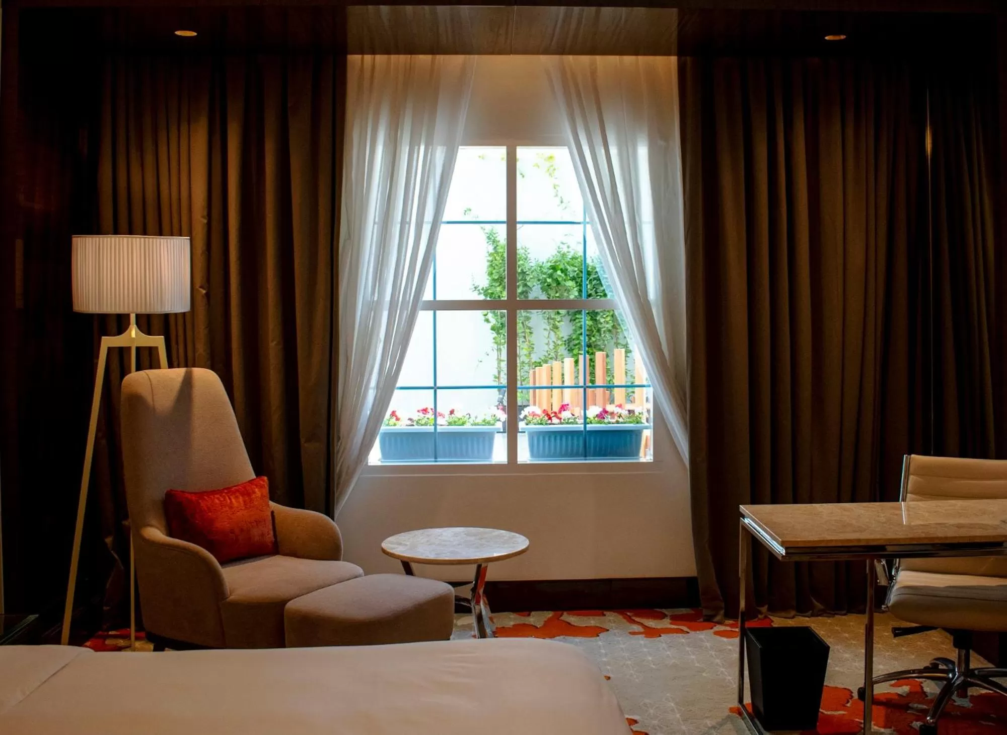 Garden view, Bed in Radisson Blu Hotel, Ajman