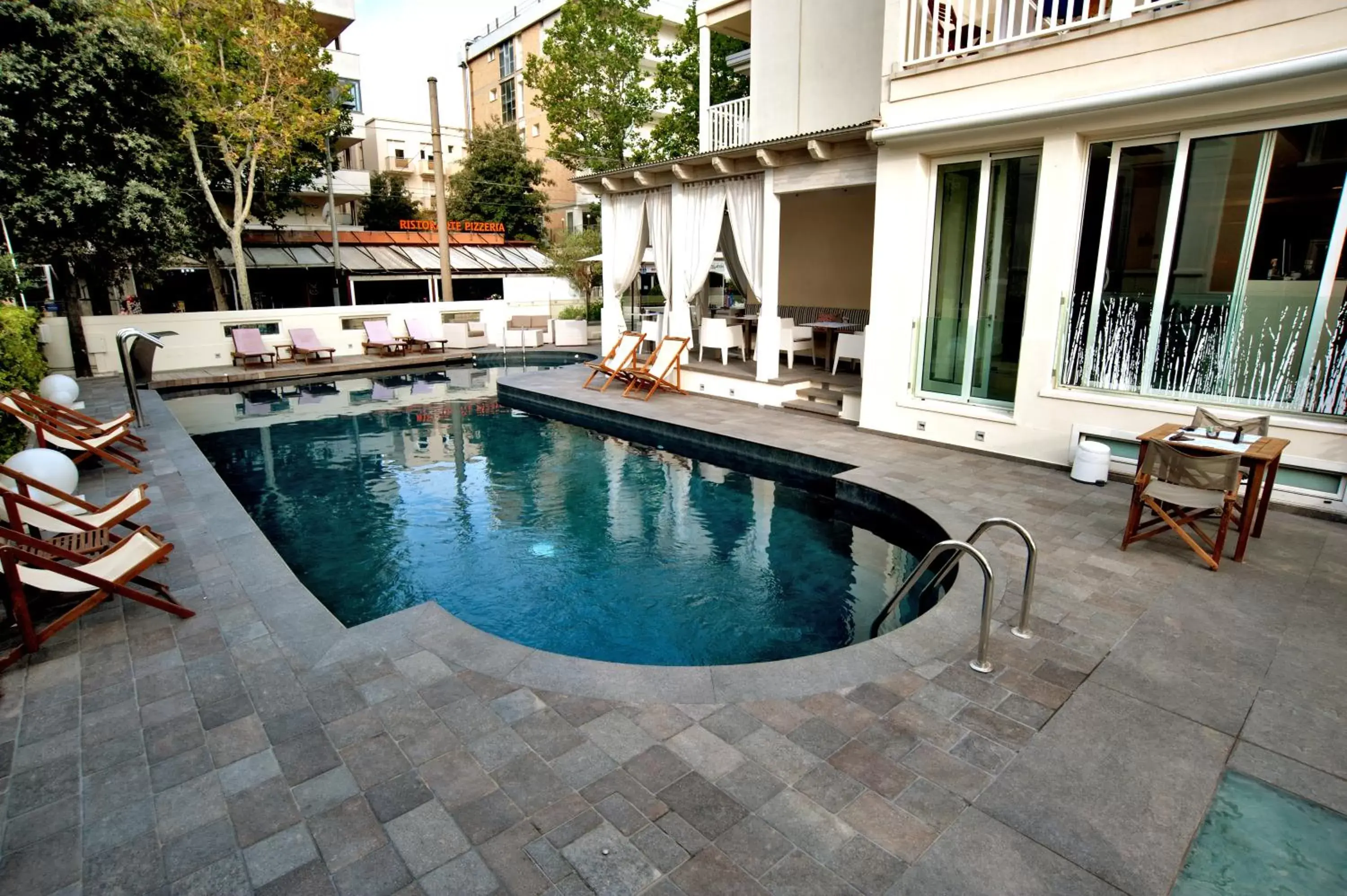 Swimming Pool in Le Rose Suite Hotel