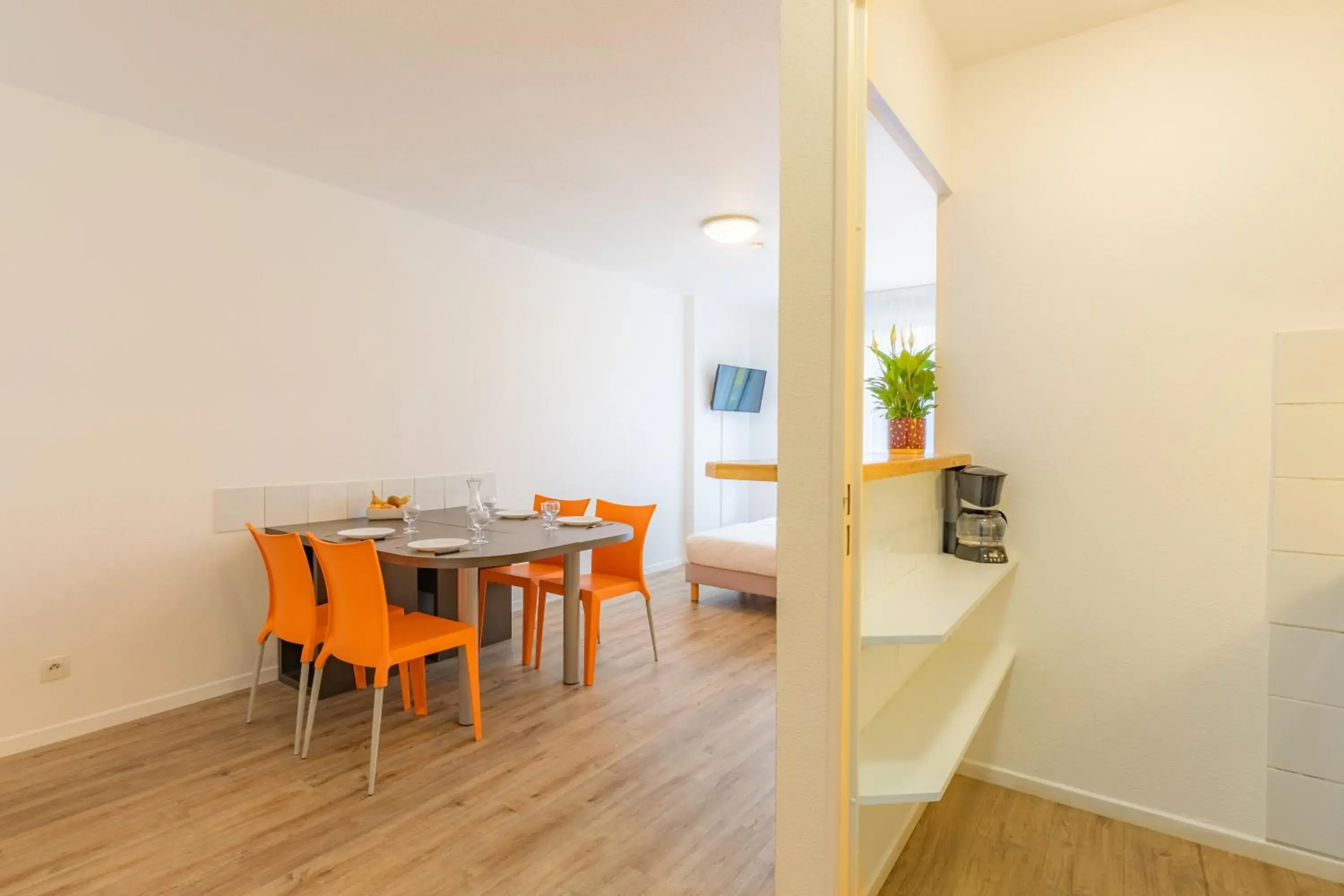 Living room, Dining Area in Appart'City Bourg en Bresse (Ex Park&Suites)