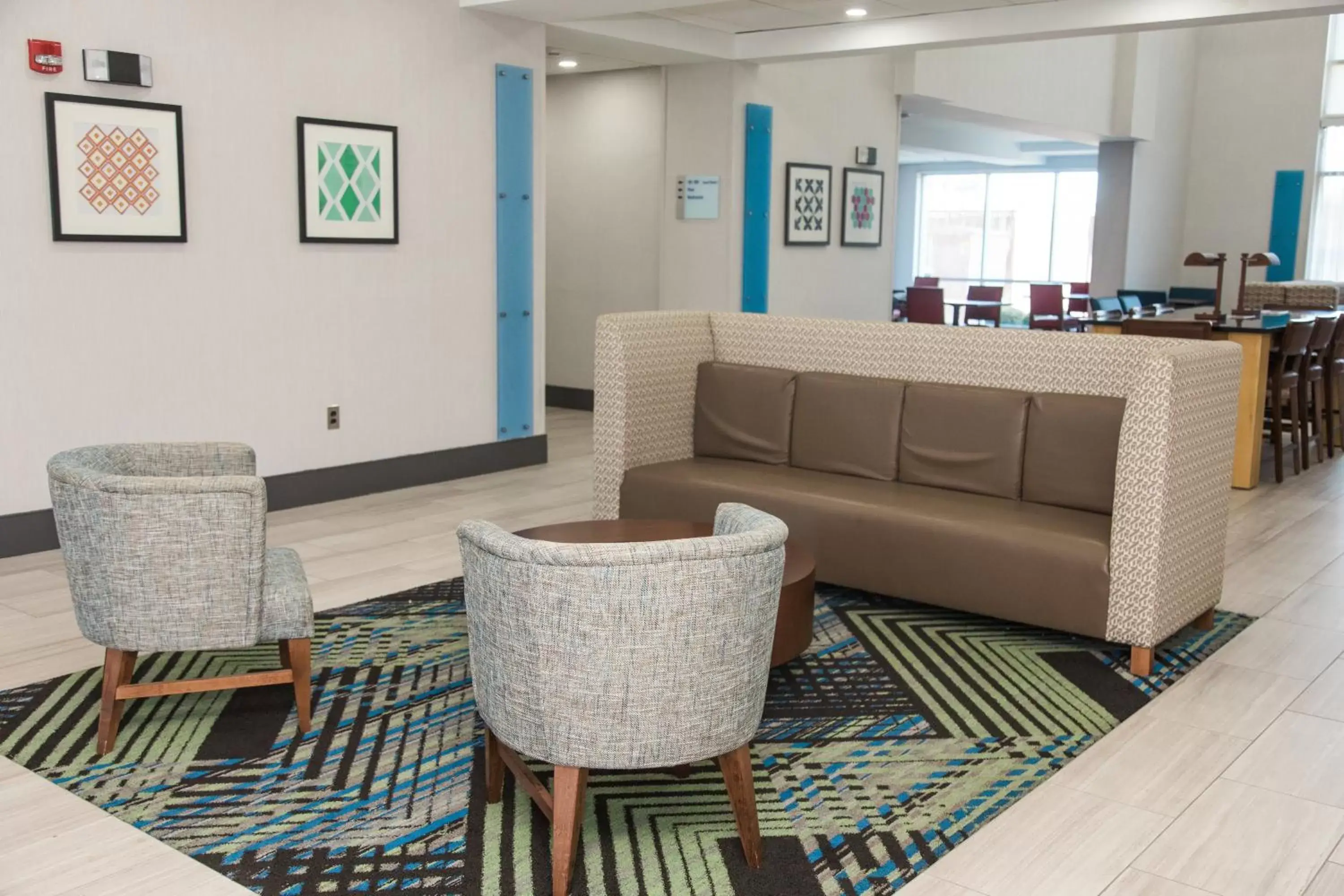 Property building, Seating Area in Holiday Inn Express Hotel & Suites Columbia-Fort Jackson, an IHG Hotel