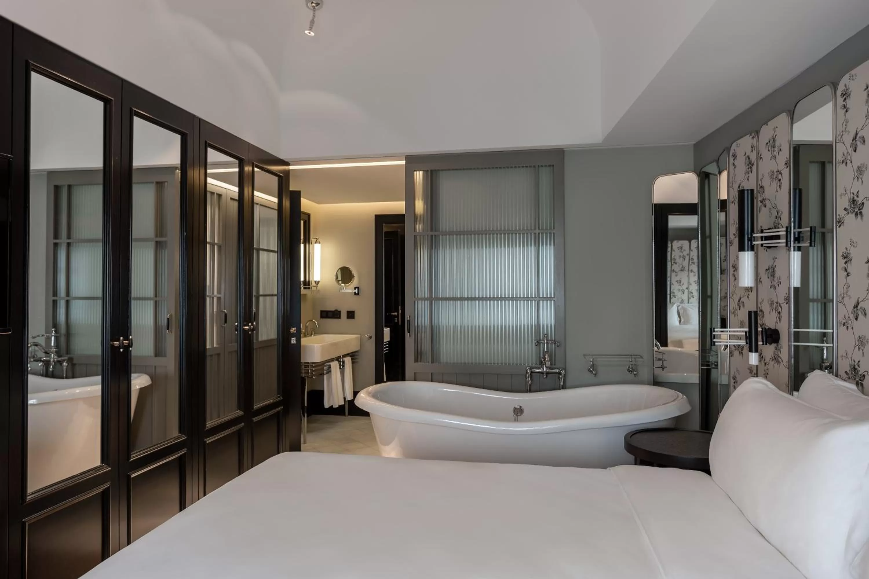 Bed in The Wings Hotels Collection