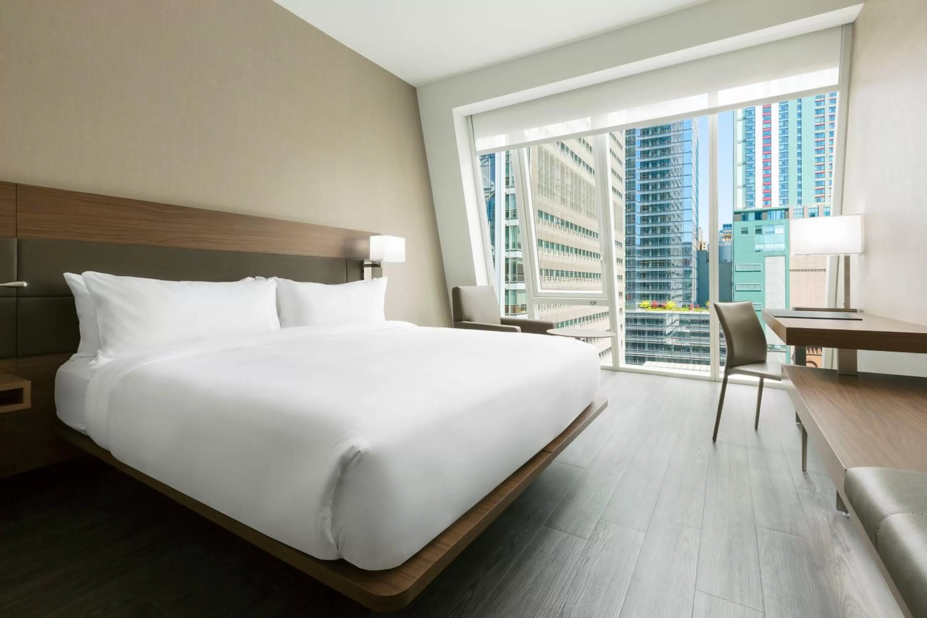 Photo of the whole room, Bed in AC Hotel by Marriott New York Times Square