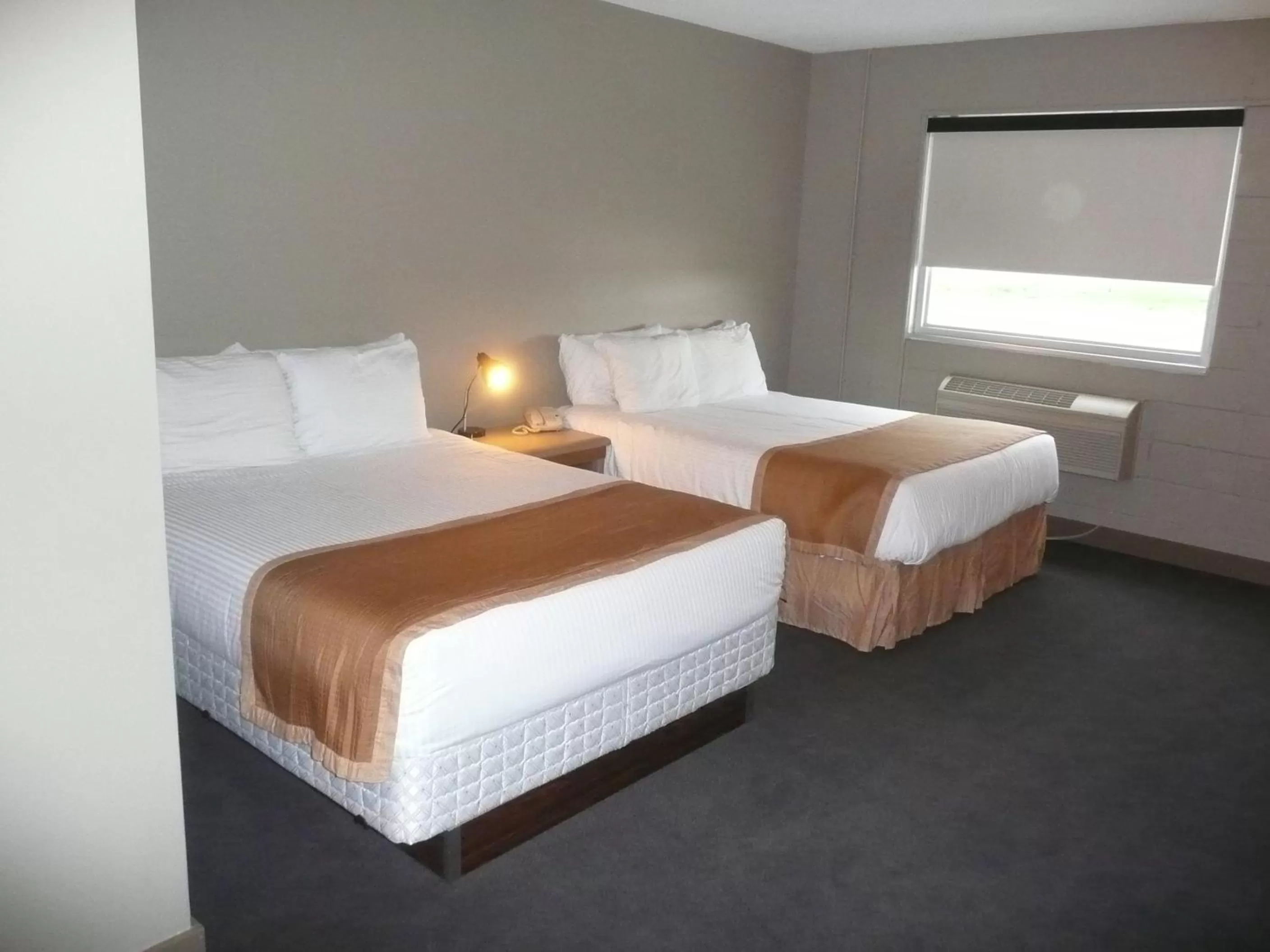 Bed in Sandstone Motel