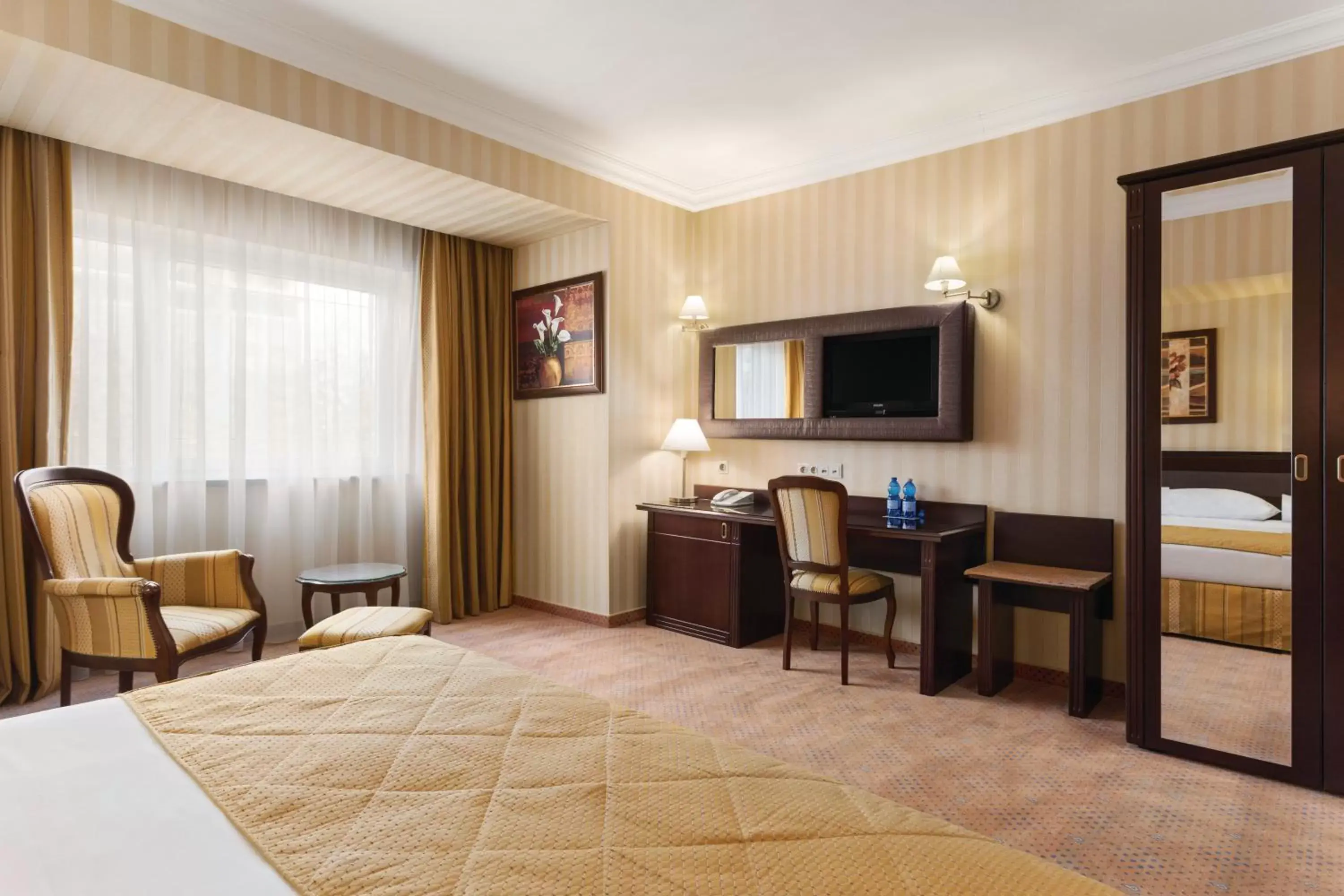Photo of the whole room, TV/Entertainment Center in Ramada Hotel & Suites by Wyndham Bucharest North