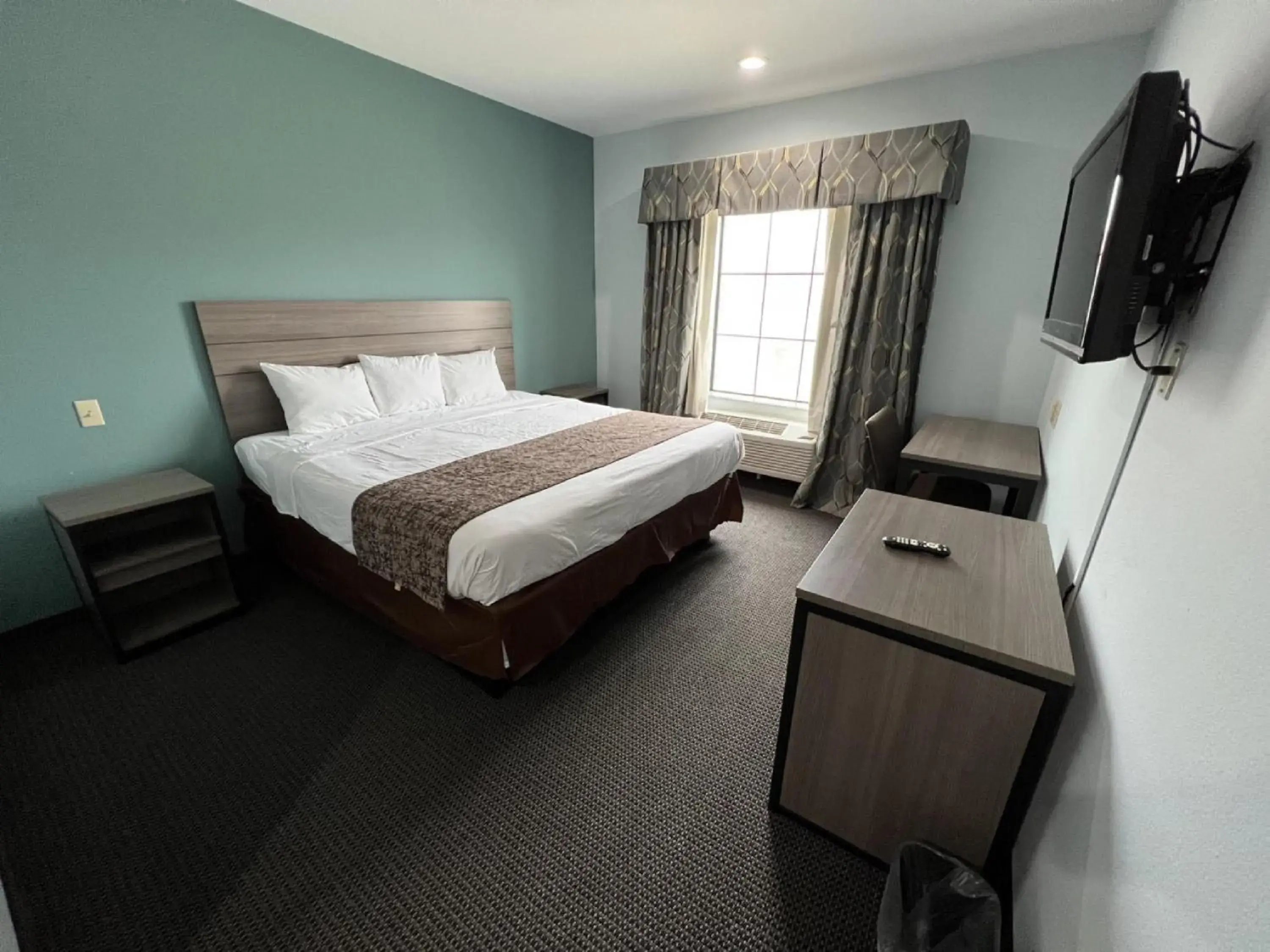 Bed in Americas Best Value Inn Sulphur Bed in Americas Best Value Inn Sulphur