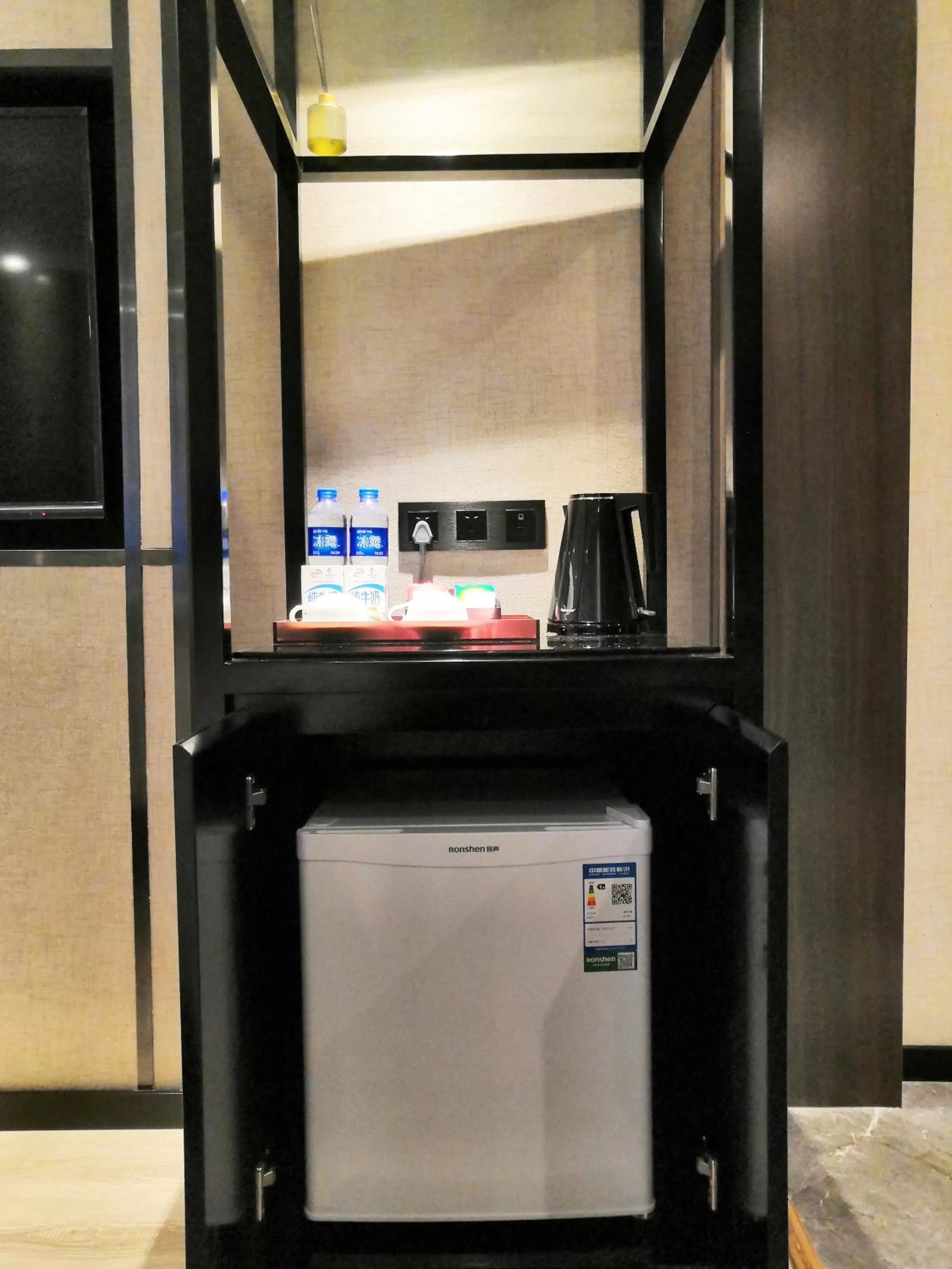 Decorative detail, TV/Entertainment Center in Paco Hotel Tiyuxilu Metro Guangzhou-Free Shuttle Bus fir Canton Fair