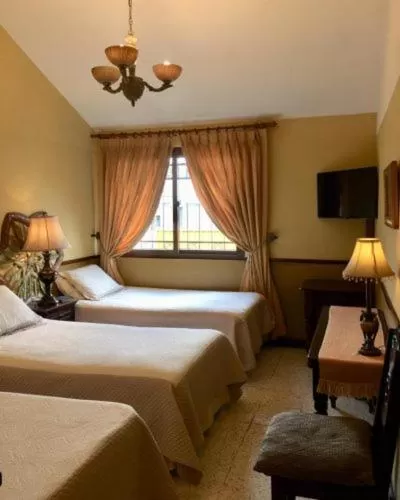 Bed in Hostal Villa Toscana