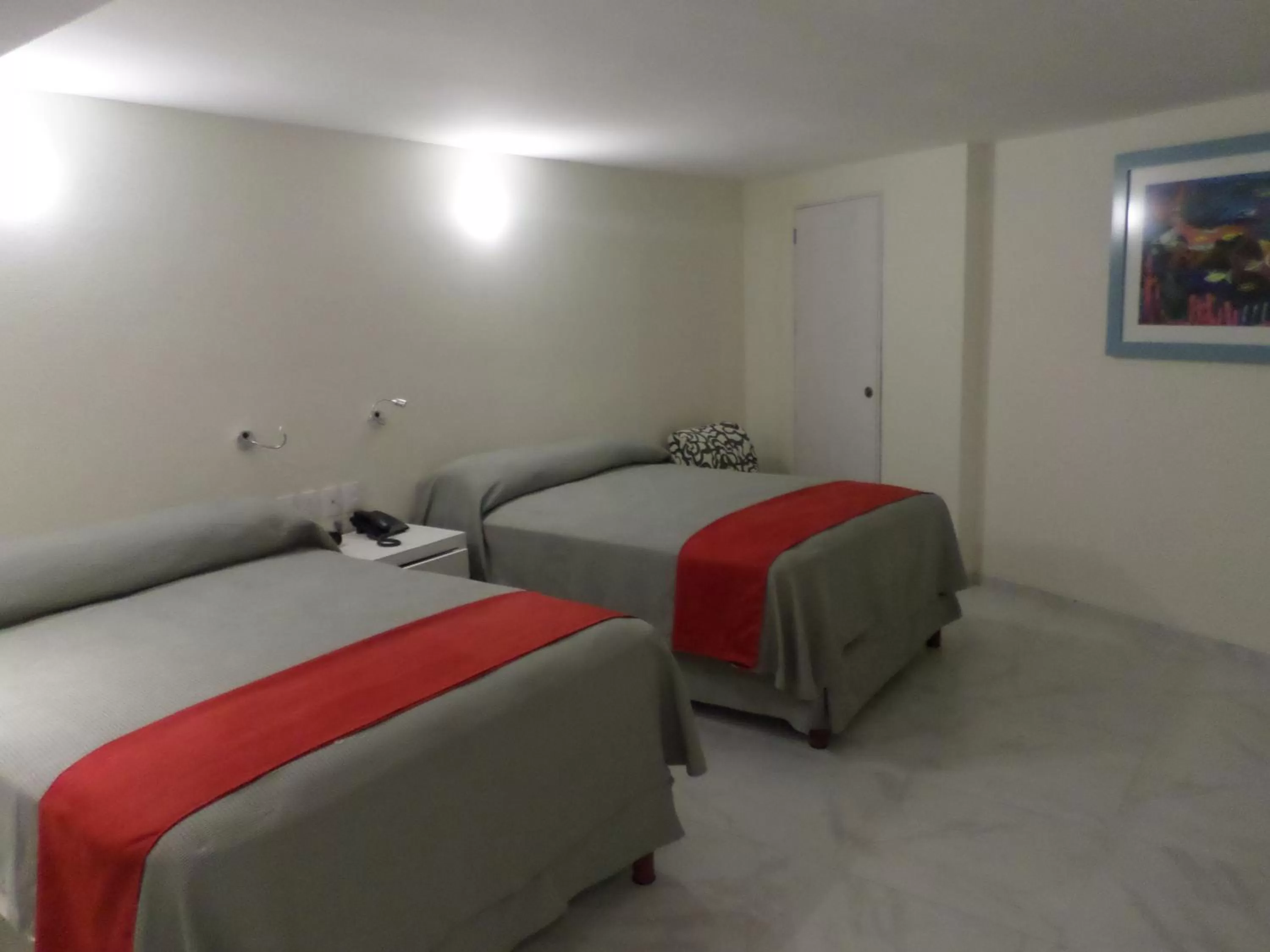 Photo of the whole room, Bed in We Hotel Acapulco